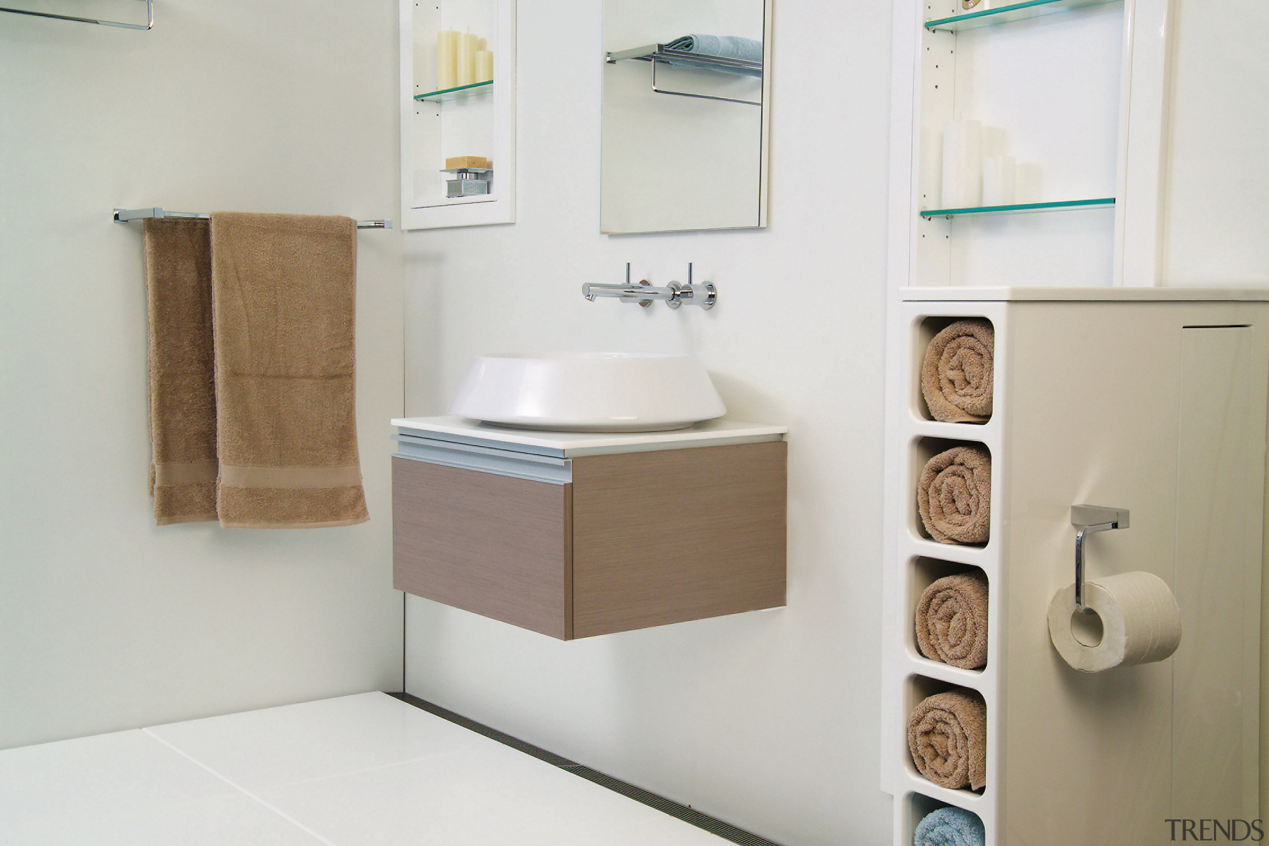 A view of a bathroom, tiled floor, , bathroom, bathroom accessory, bathroom cabinet, bathroom sink, ceramic, plumbing fixture, product, product design, room, sink, tap, toilet, toilet seat, white, gray