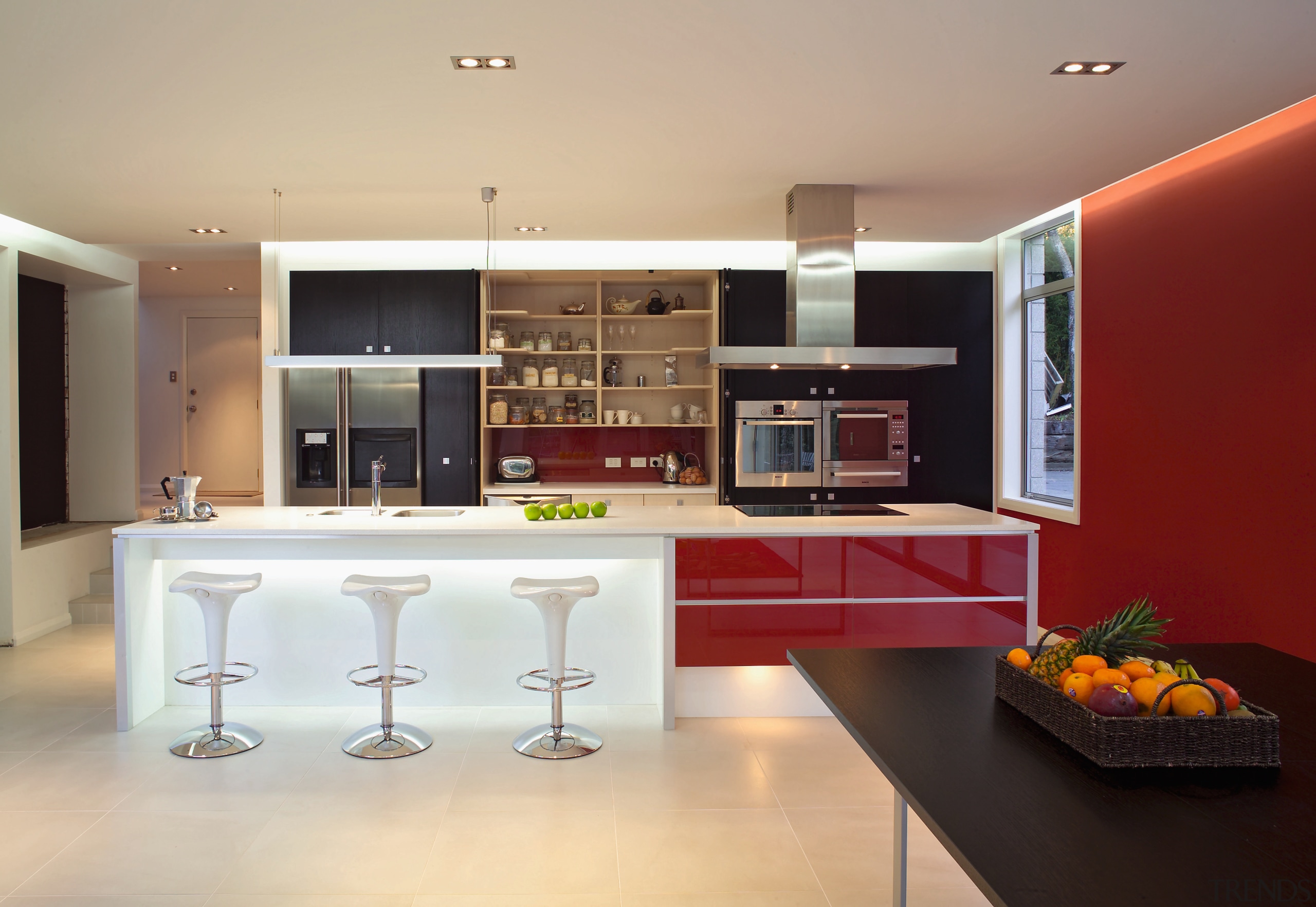 view of this kitchen featuring ameron caprithane coating cabinetry, countertop, cuisine classique, interior design, interior designer, kitchen, living room, real estate, room, orange