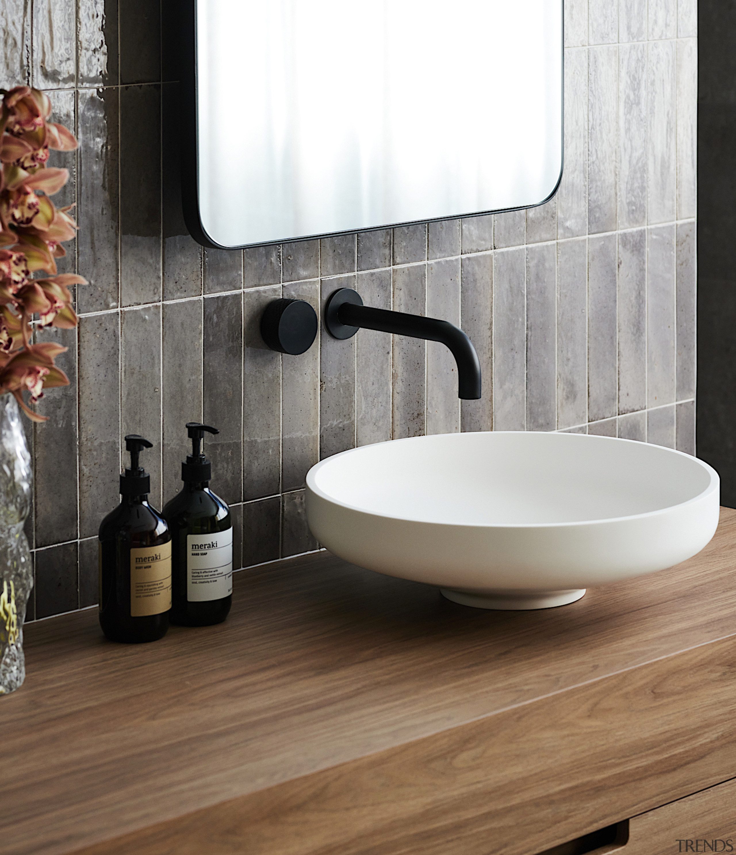 An Omvivo Venice table top basin adds to 