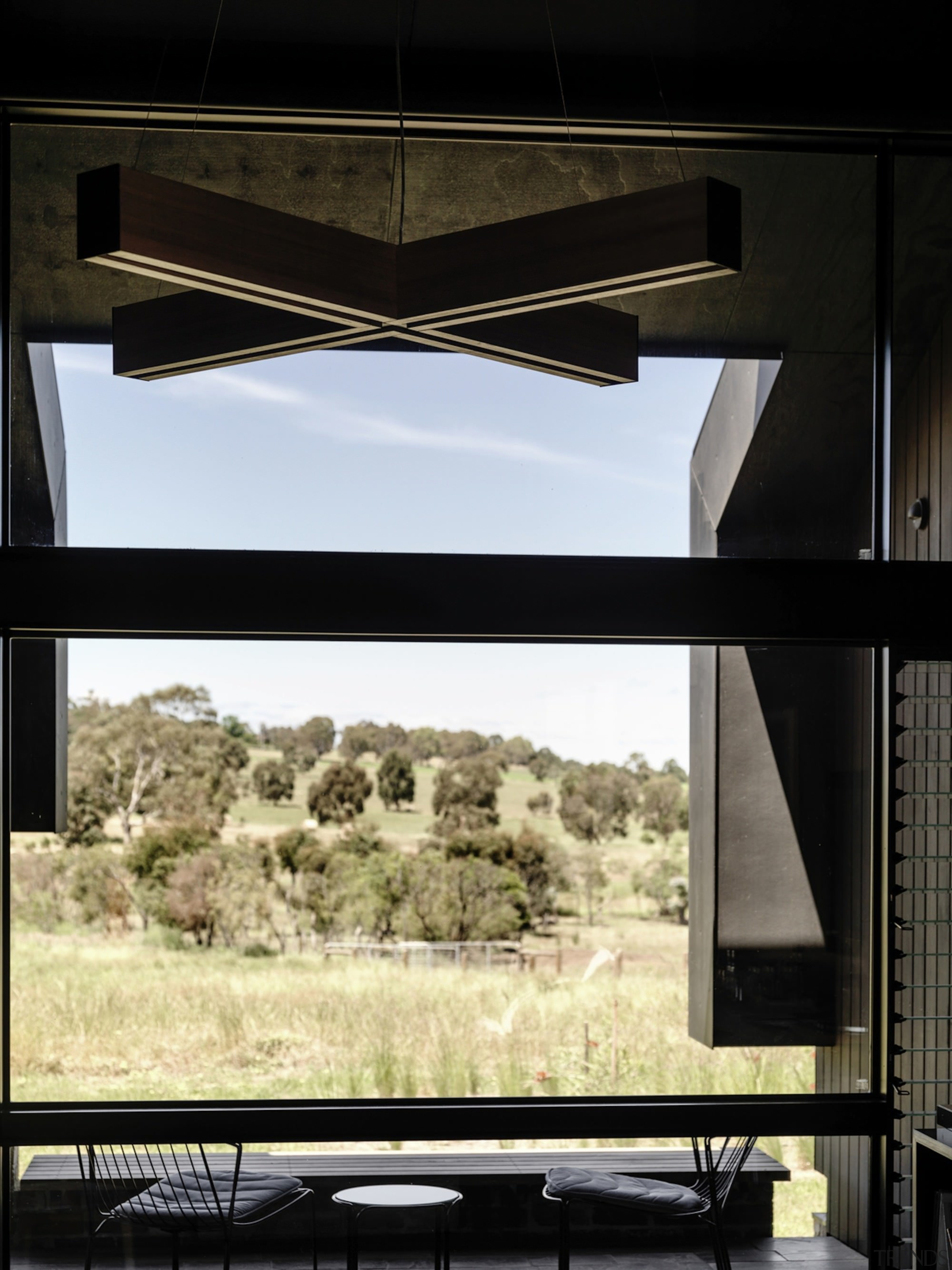 This unique lamp creates an interesting focal point architecture, window, black