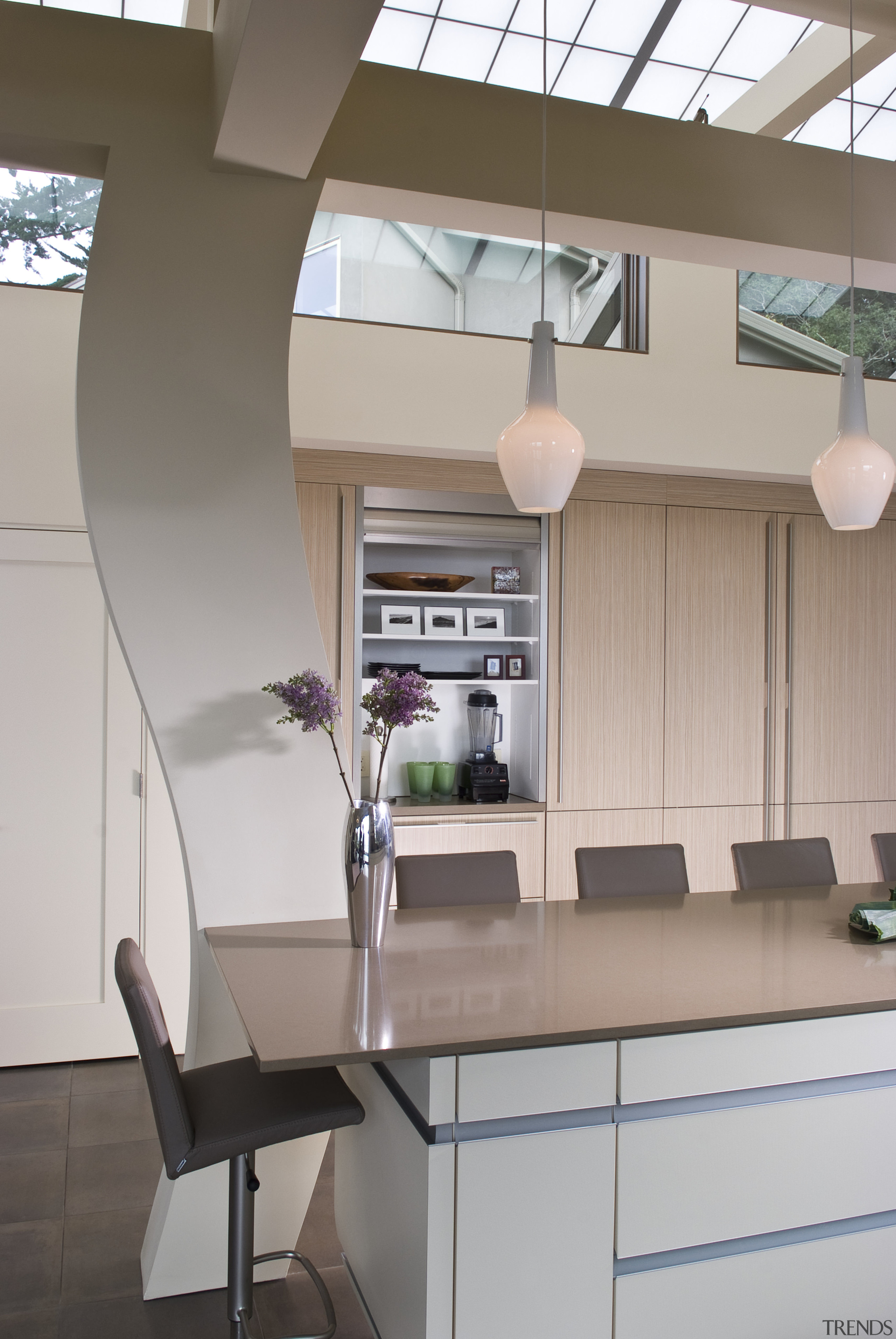 View of neutral-toned kitchen and dining space, featuring ceiling, furniture, interior design, kitchen, office, product design, gray