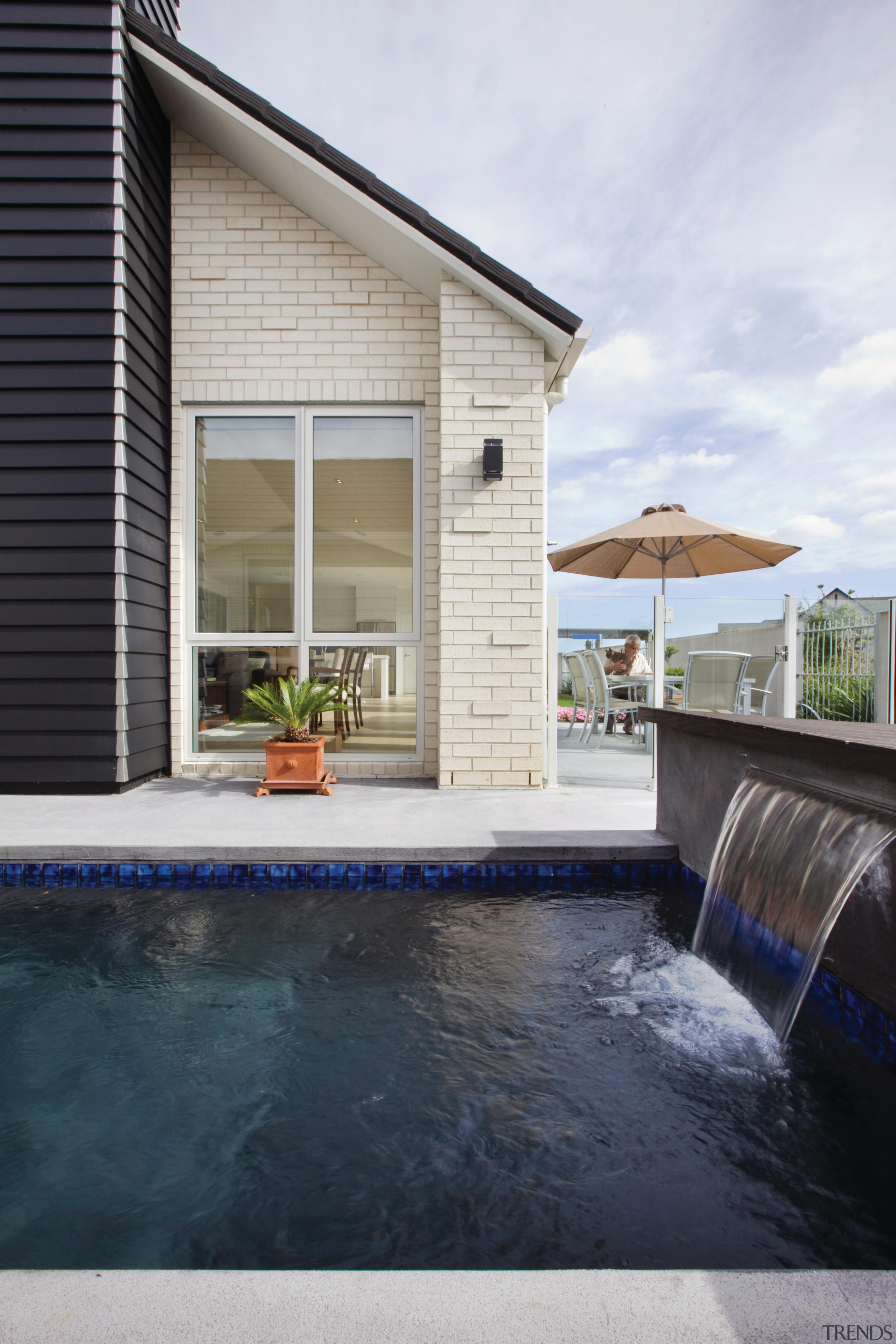 The perfect showcase of bricks versatility. Designed to architecture, building, home, house, property, real estate, reflection, residential area, swimming pool, water, window, black, gray, white