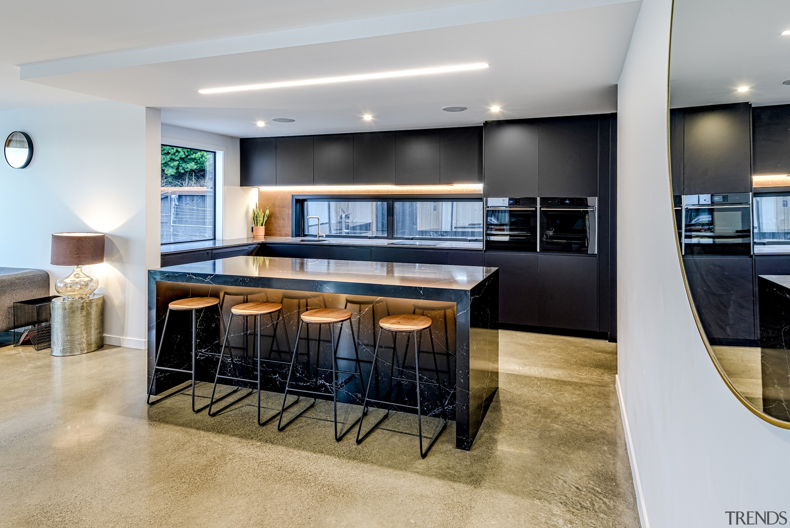 For this project, the homeowners wanted a matt apartment, architecture, building, cabinetry, ceiling, countertop, design, dining room, floor, flooring, furniture, home, house, interior design, kitchen, living room, property, real estate, room, table, gray