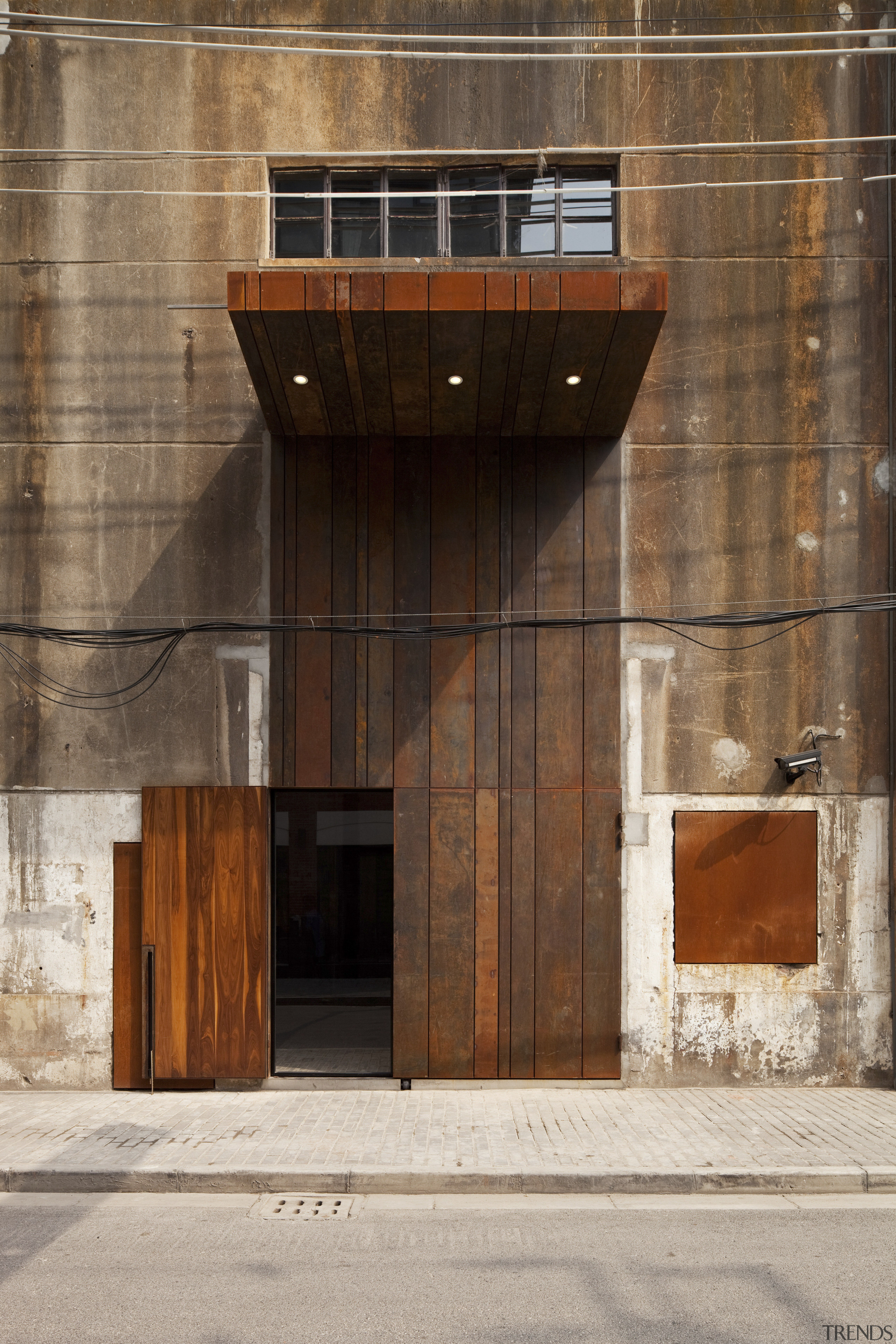 View of a contemporary boutique hotel in Shanghai. architecture, building, facade, window, wood, brown