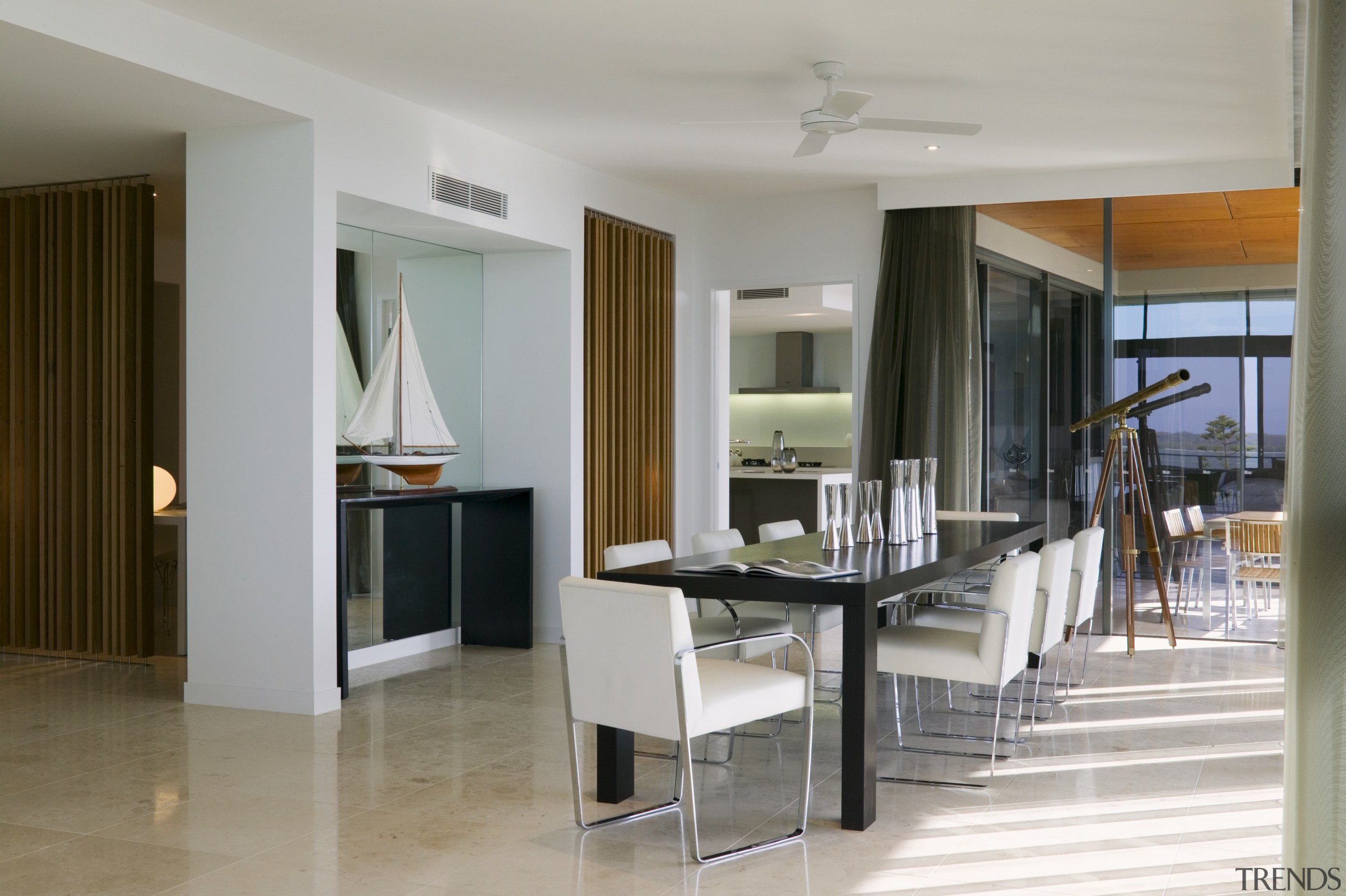 A view of the dining area featuring black floor, flooring, interior design, real estate, room, gray