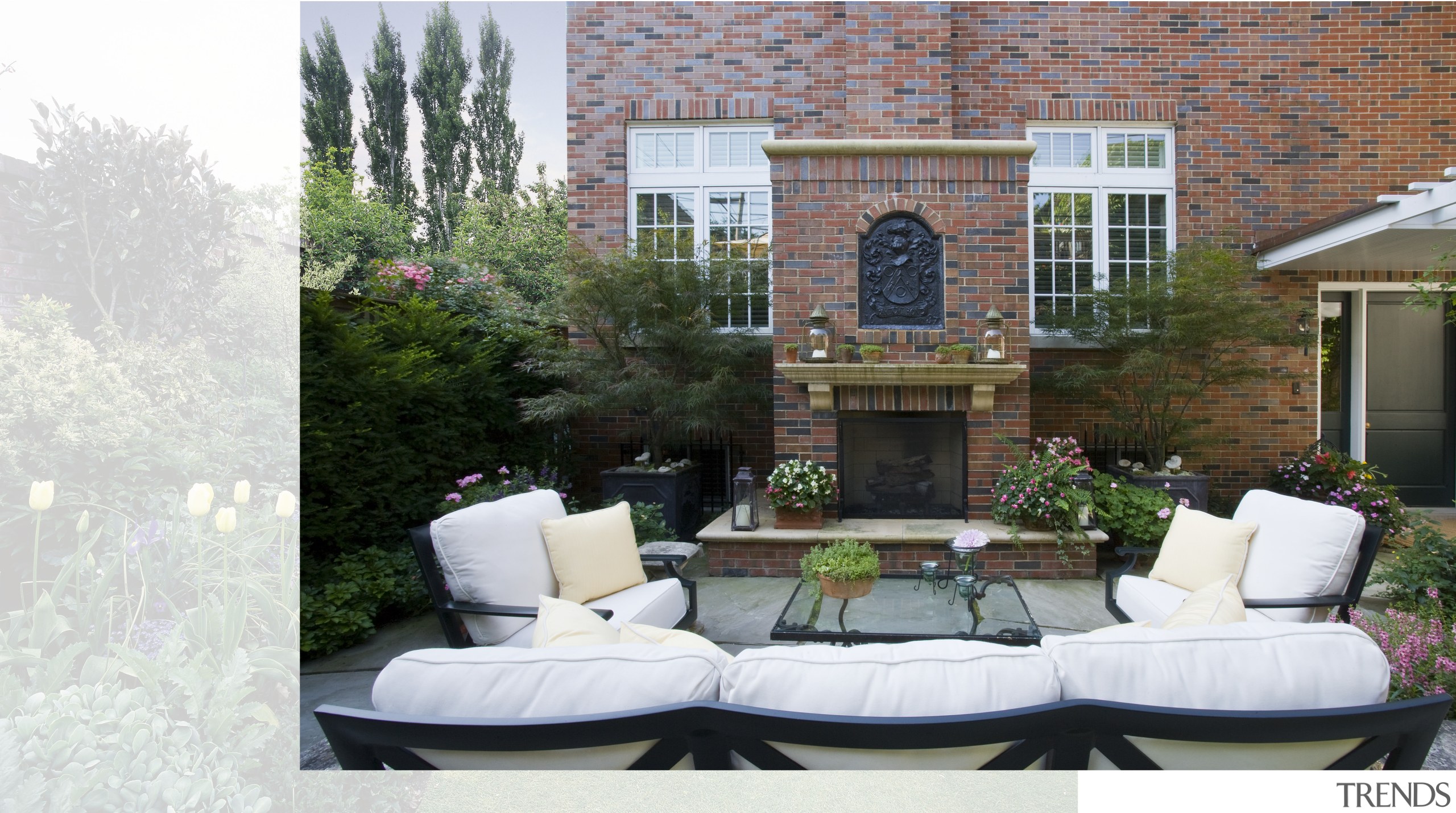 Exterior view of this traditional home by Nicholas backyard, furniture, home, house, interior design, outdoor furniture, outdoor structure, patio, window, white