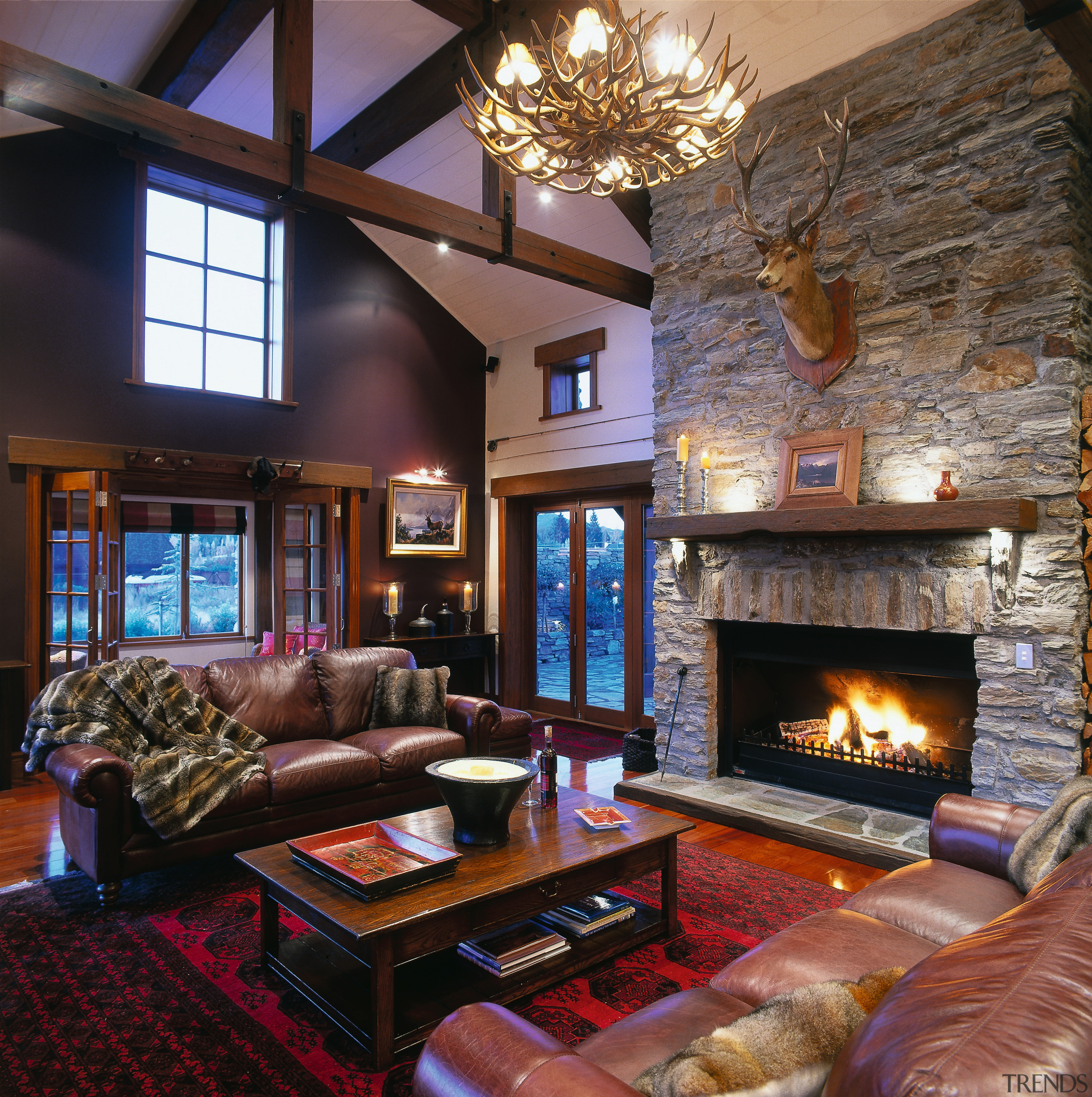 A view of the living area, wooden flooring, ceiling, fireplace, home, interior design, living room, real estate, room, wood, black