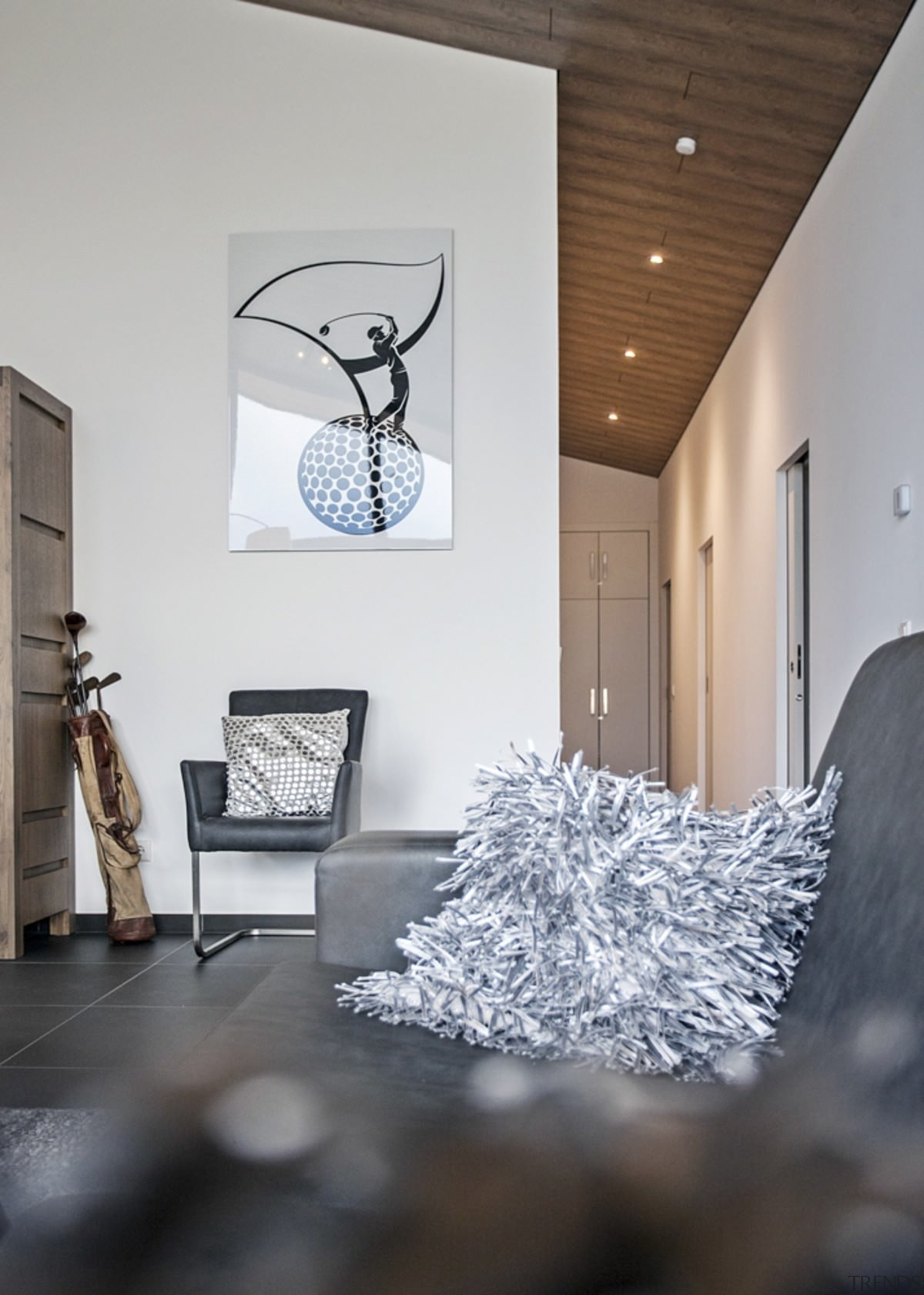 Tasteful lighting runs down the hallway - Tasteful architecture, ceiling, daylighting, floor, home, house, interior design, light fixture, living room, room, table, gray