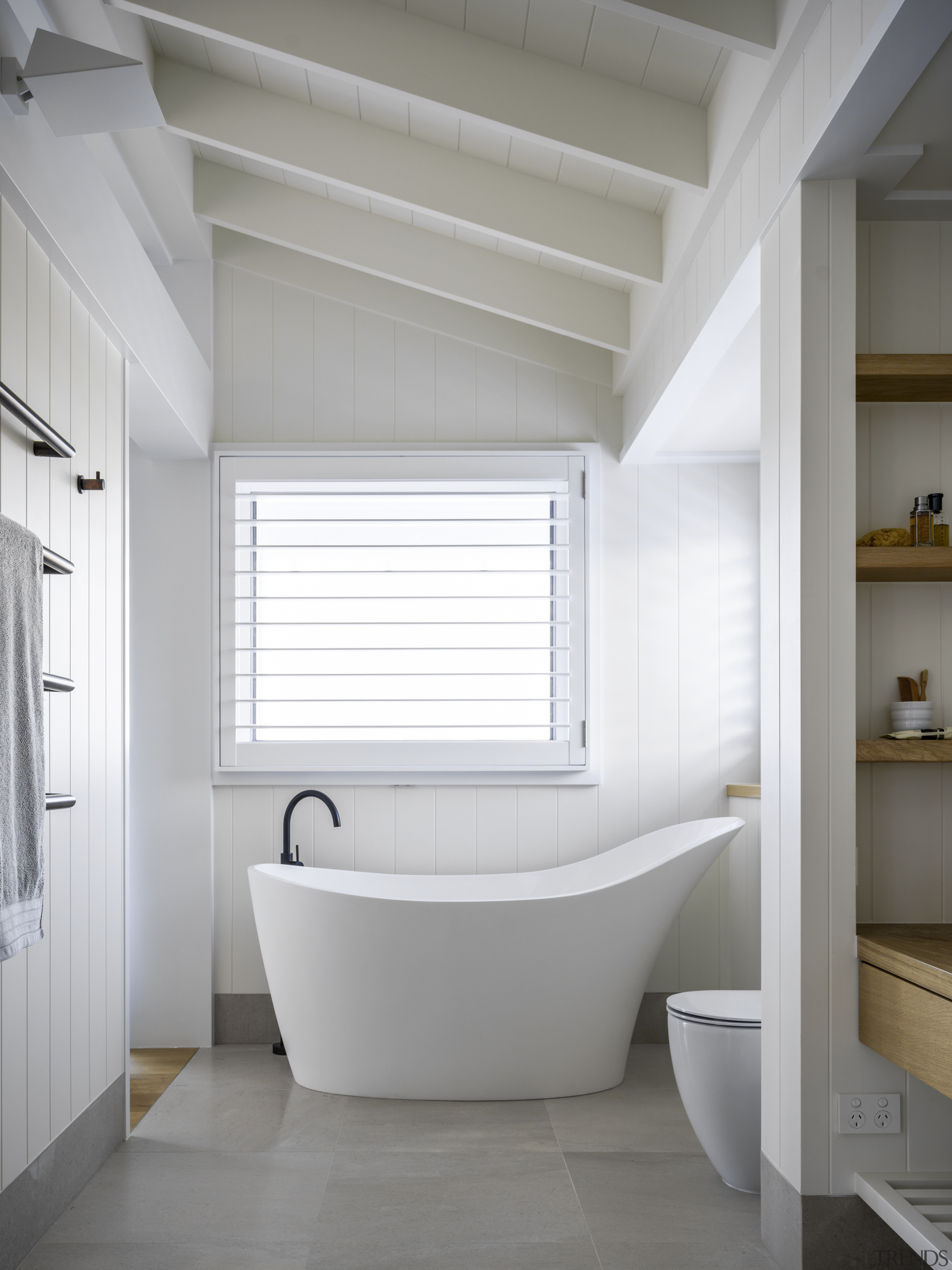 ​​​​​​​The aptly named slipper bath provides a focal architecture, bathroom, bathtub, slipper bath, ensuite, white weatherboard finish, hamptons style