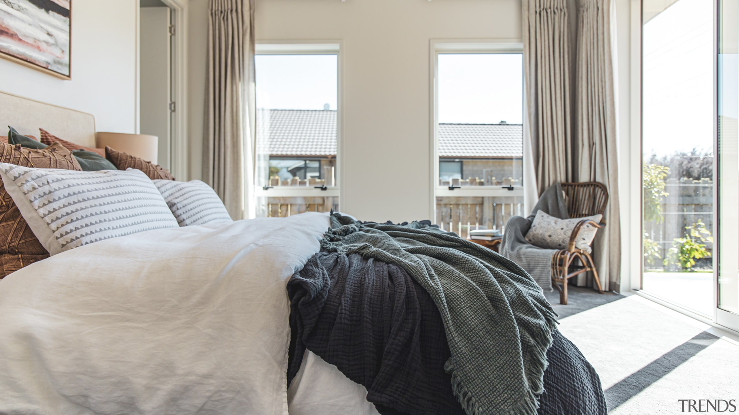 The corner master bedroom has windows for Africa. 