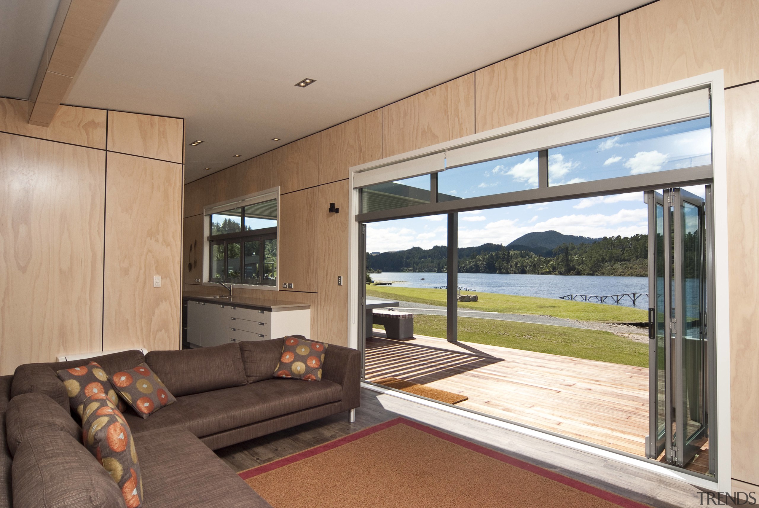 View of the large opening doors that lead door, house, interior design, property, real estate, window, white, orange