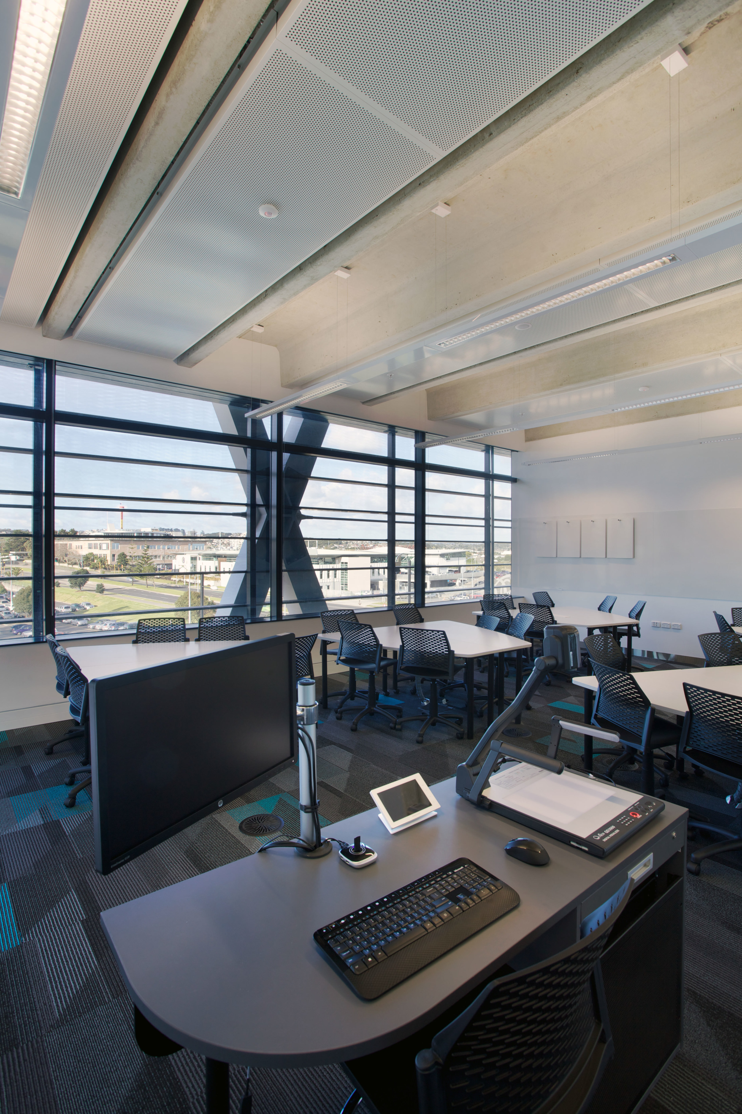 Office with interactive technology for tertiary institute MIT architecture, interior design, office, gray, black