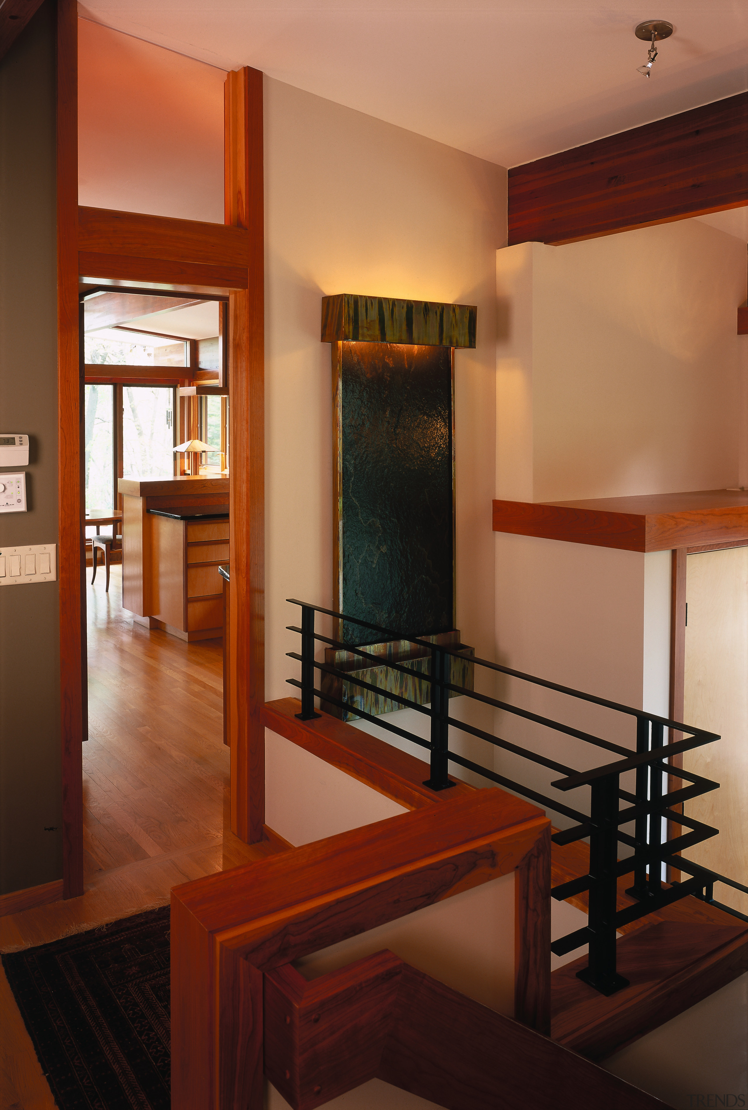 A view of the stairway, wooden flooring, spotlights, architecture, ceiling, floor, flooring, hardwood, home, interior design, living room, real estate, room, table, wall, window, wood, red, orange