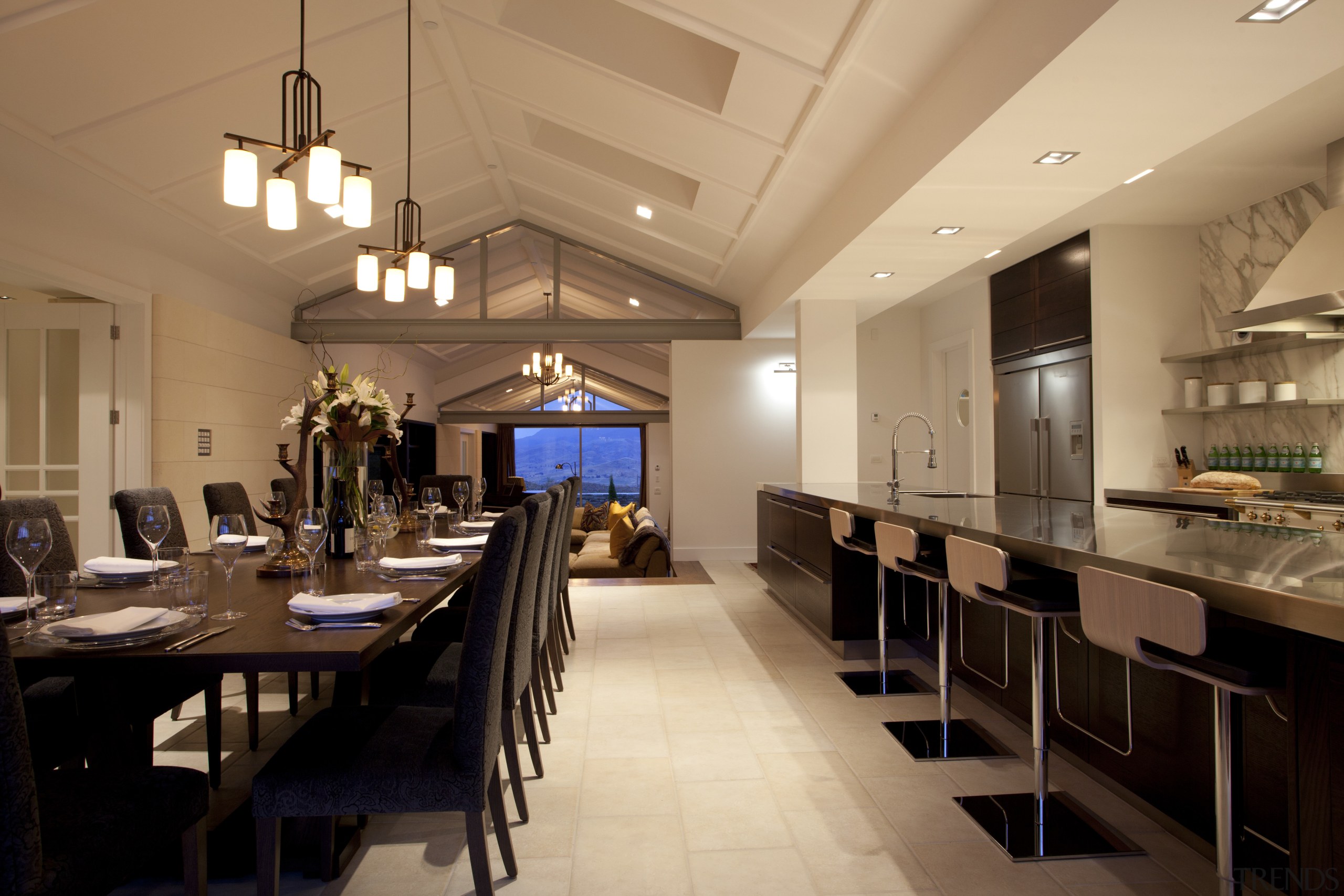 View of the kitchen and dining areas. - ceiling, countertop, interior design, kitchen, restaurant, orange, brown