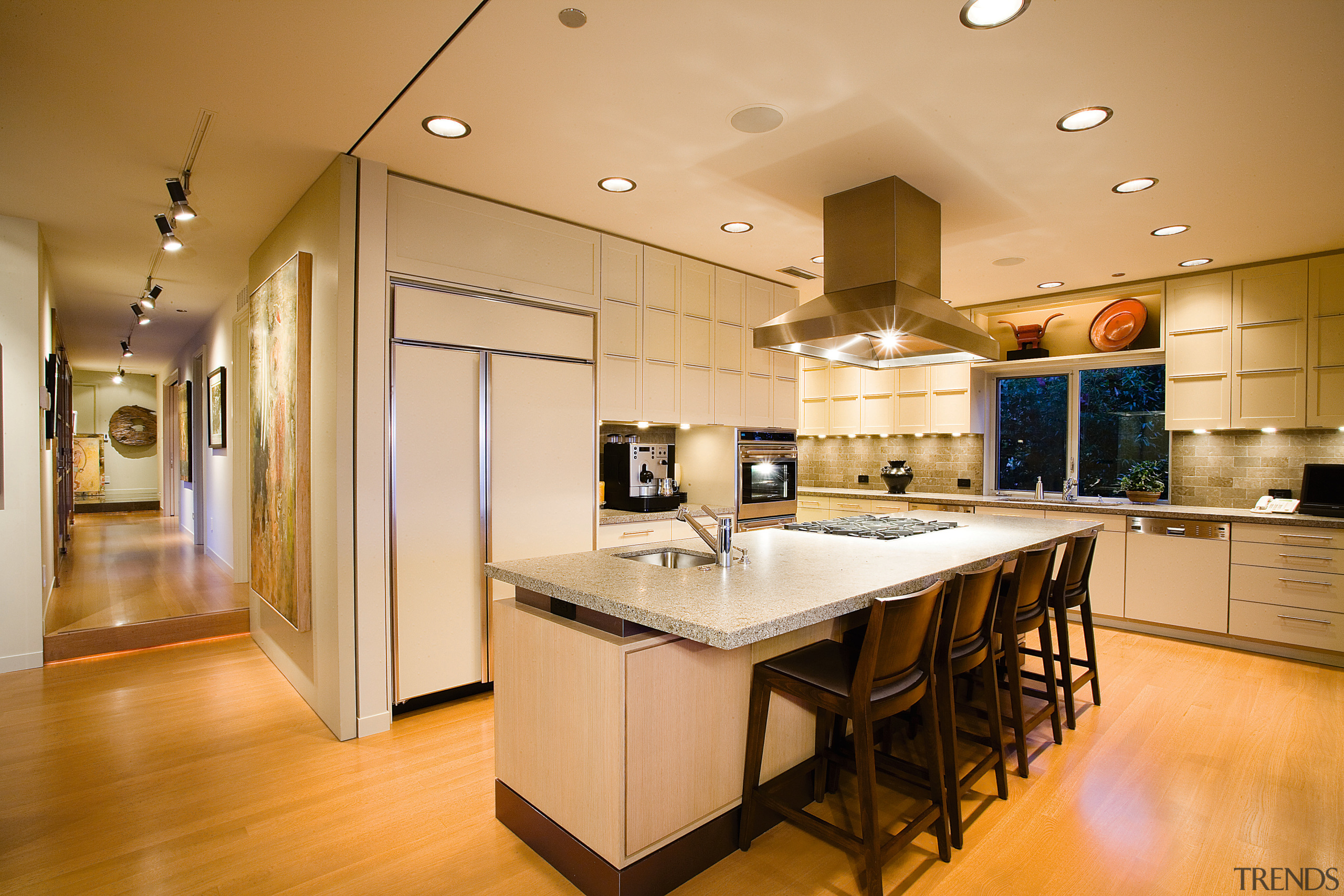 view of the kitchen  featuring stainless steel cabinetry, ceiling, countertop, cuisine classique, flooring, hardwood, home, interior design, kitchen, real estate, room, wood flooring, orange, brown