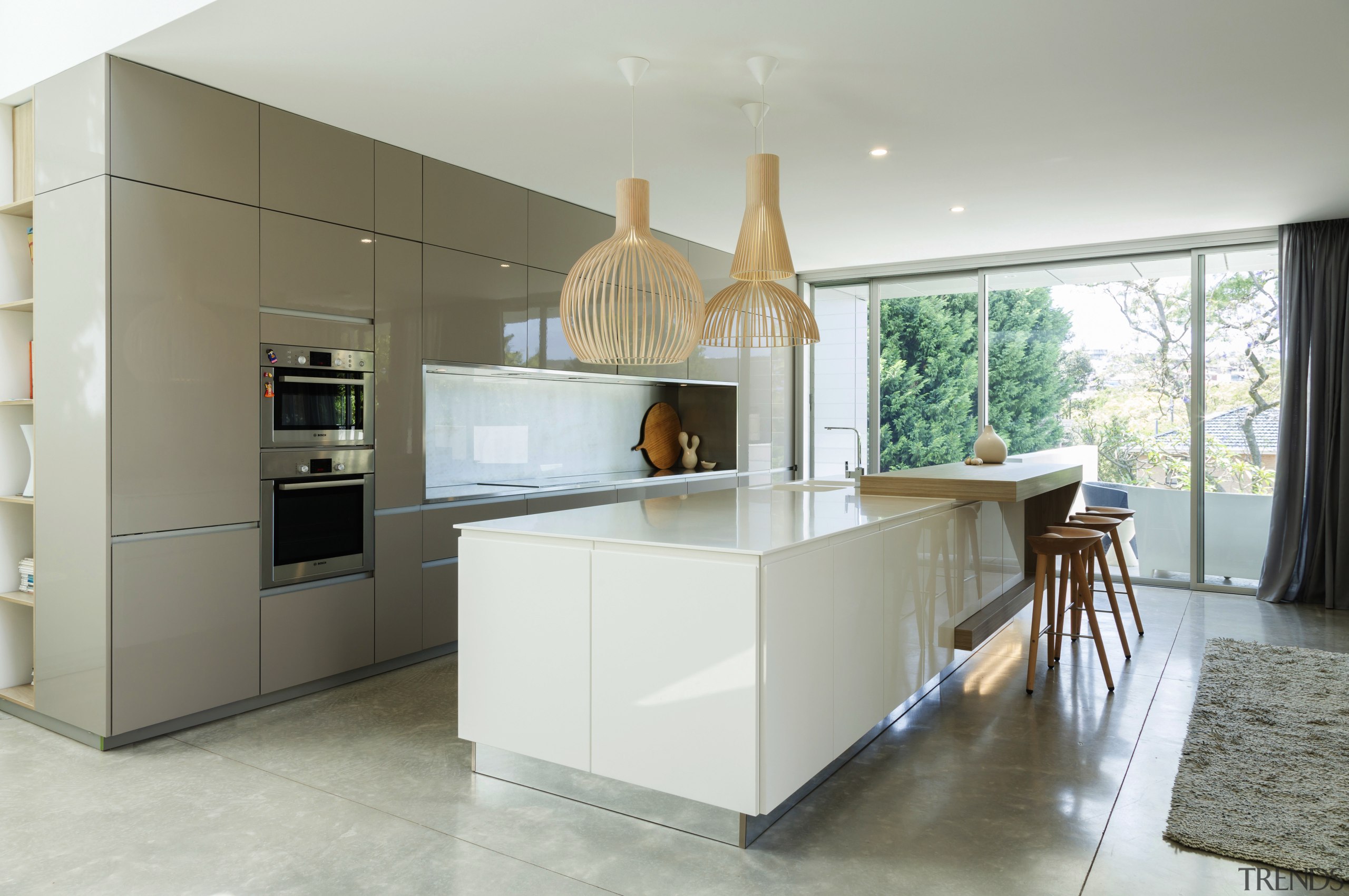 In this kitchen by Nancy Frost, reflective surfaces architecture, countertop, cuisine classique, interior design, kitchen, real estate, room, gray, white