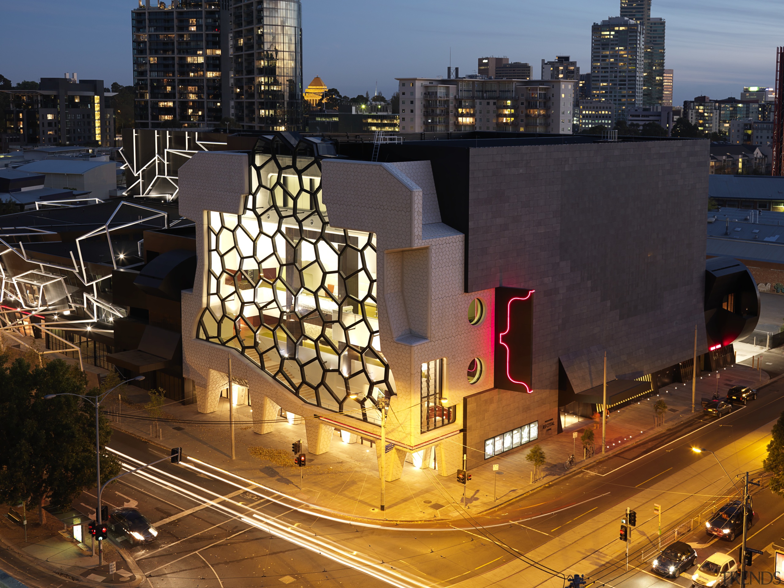 Exterior view of the MRC which features wrought architecture, building, city, cityscape, condominium, daytime, downtown, hotel, landmark, metropolis, metropolitan area, mixed use, neighbourhood, night, residential area, sky, skyline, skyscraper, tower block, urban area, black