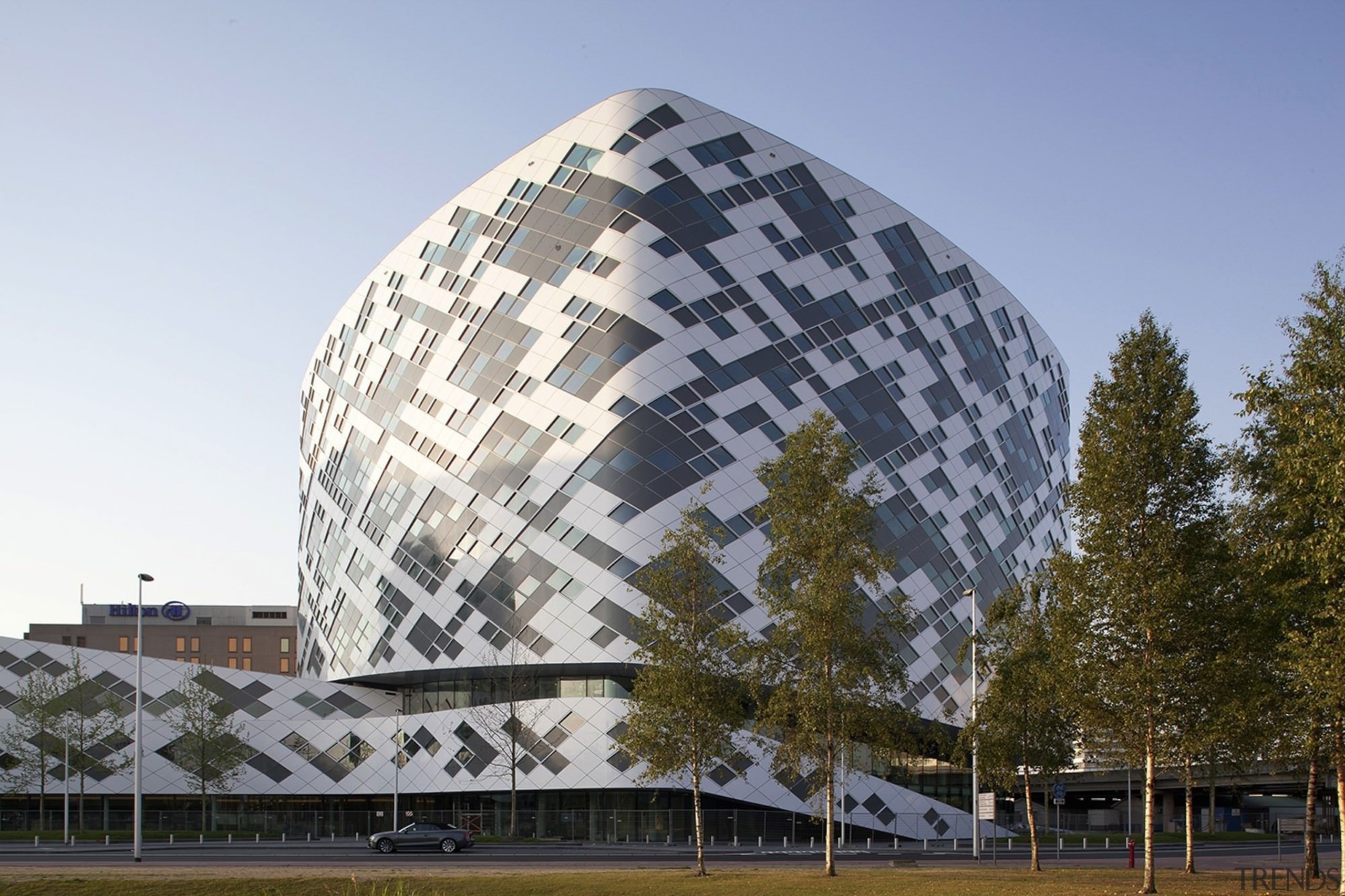 The building has the appearance of the bow architecture, building, corporate headquarters, daytime, facade, headquarters, landmark, sky, gray