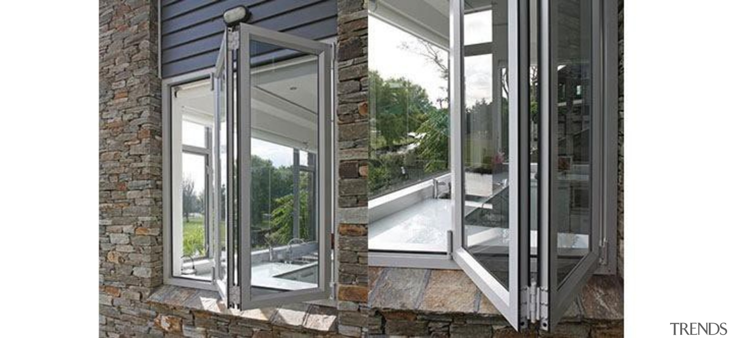 Windowmakers bi-fold windows run on an easy-slide track door, glass, porch, window, white, gray