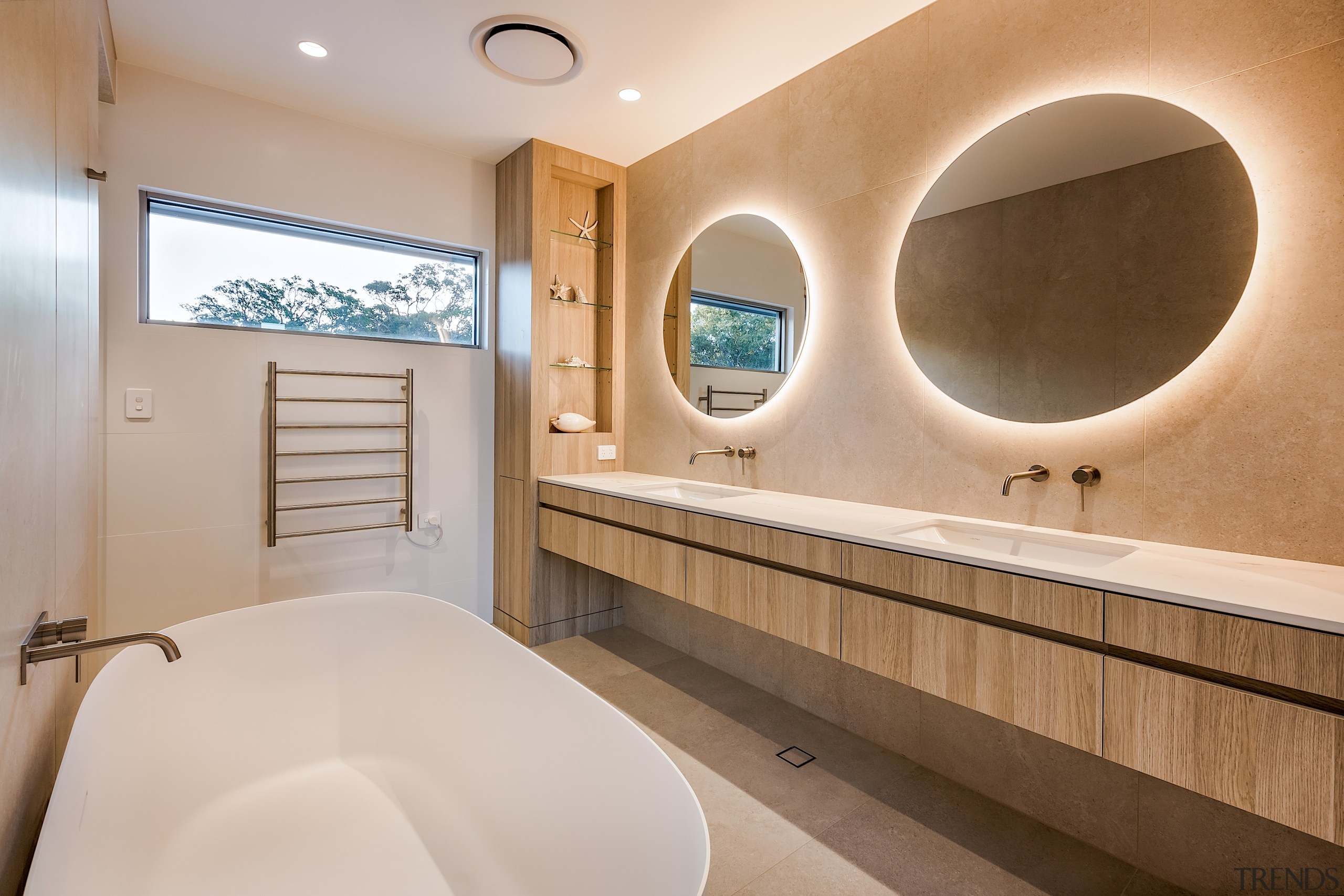 The use of natural stone and timber-look finishes 