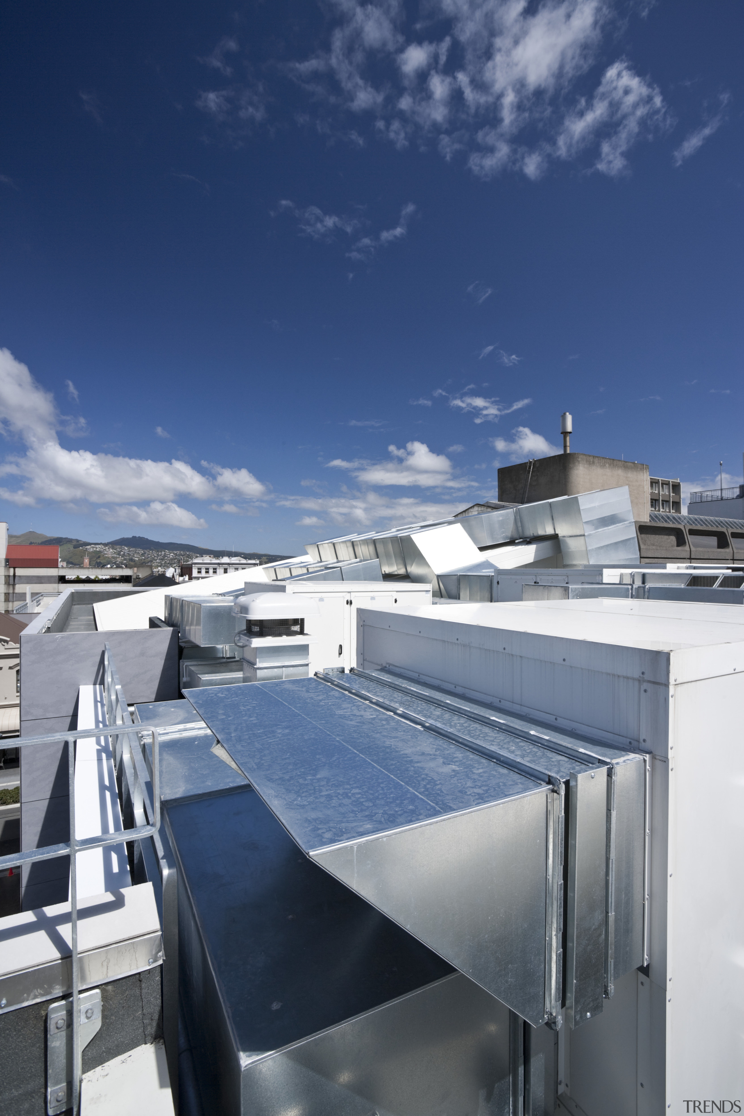 The Les Mills gymnasium features the Air-Change air architecture, building, cloud, daylighting, facade, home, house, real estate, roof, sky, blue, gray