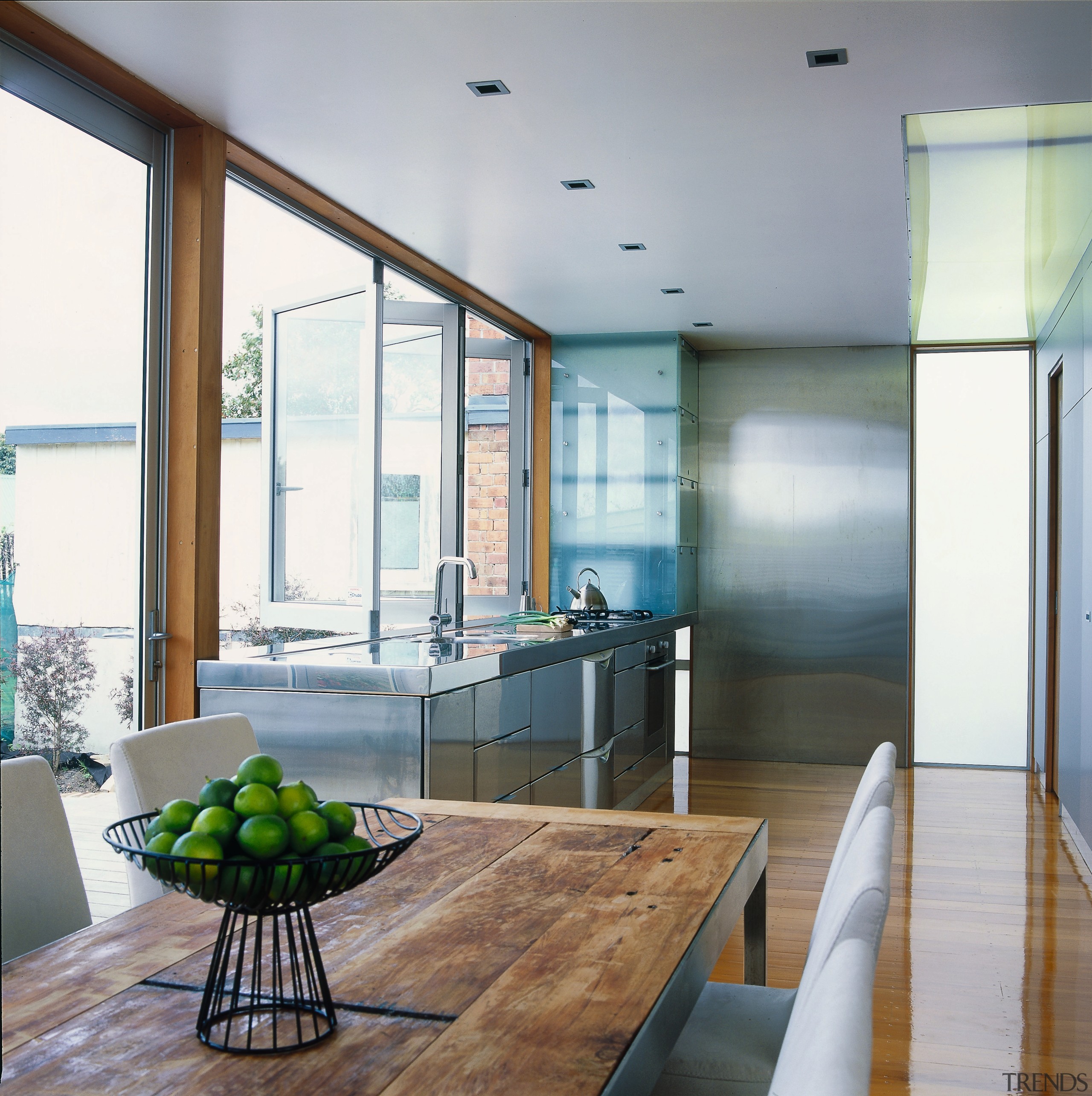 view of the dining room looking into kitchen architecture, ceiling, countertop, daylighting, glass, house, interior design, living room, real estate, table, window, gray