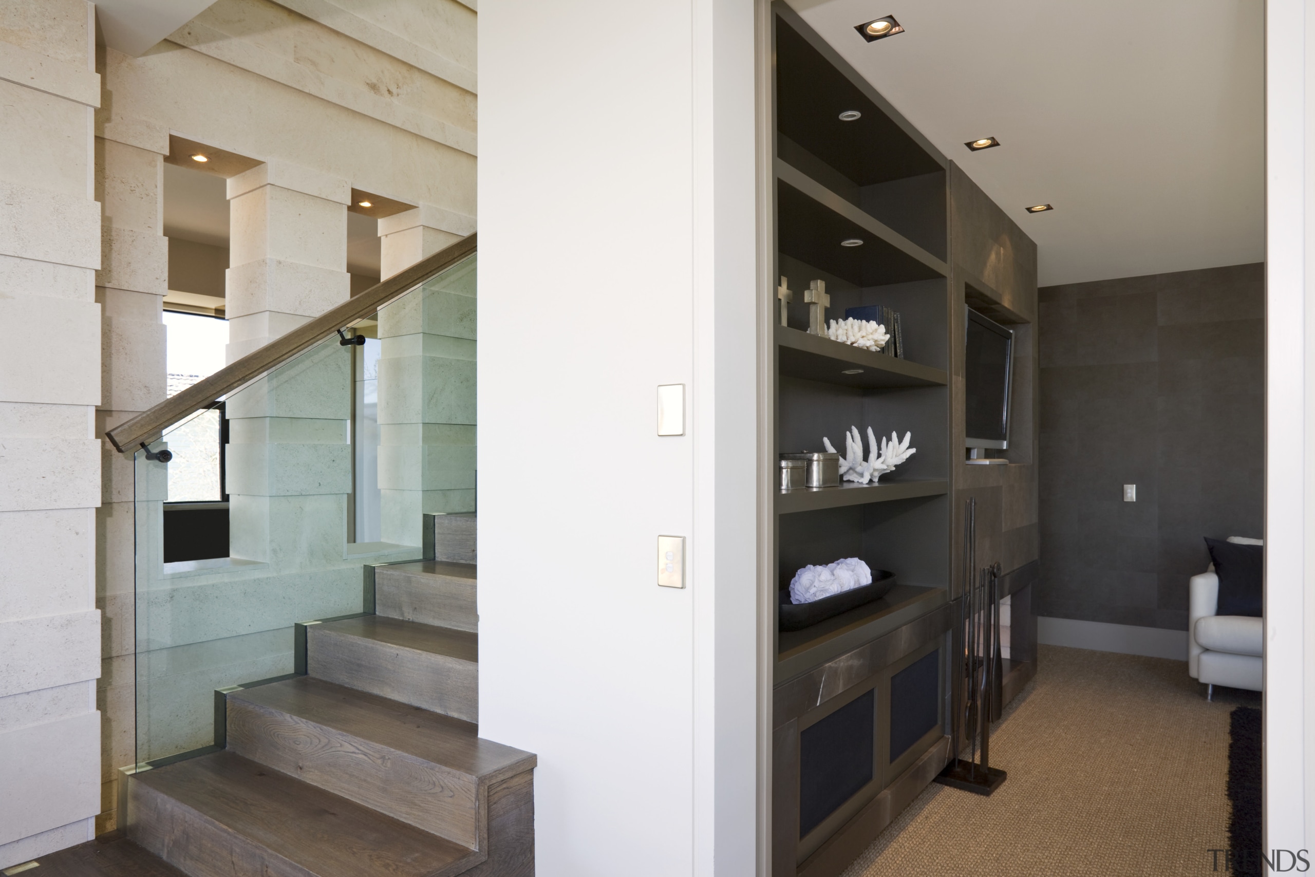 View of a stairway with a glass ballustarde interior design, white