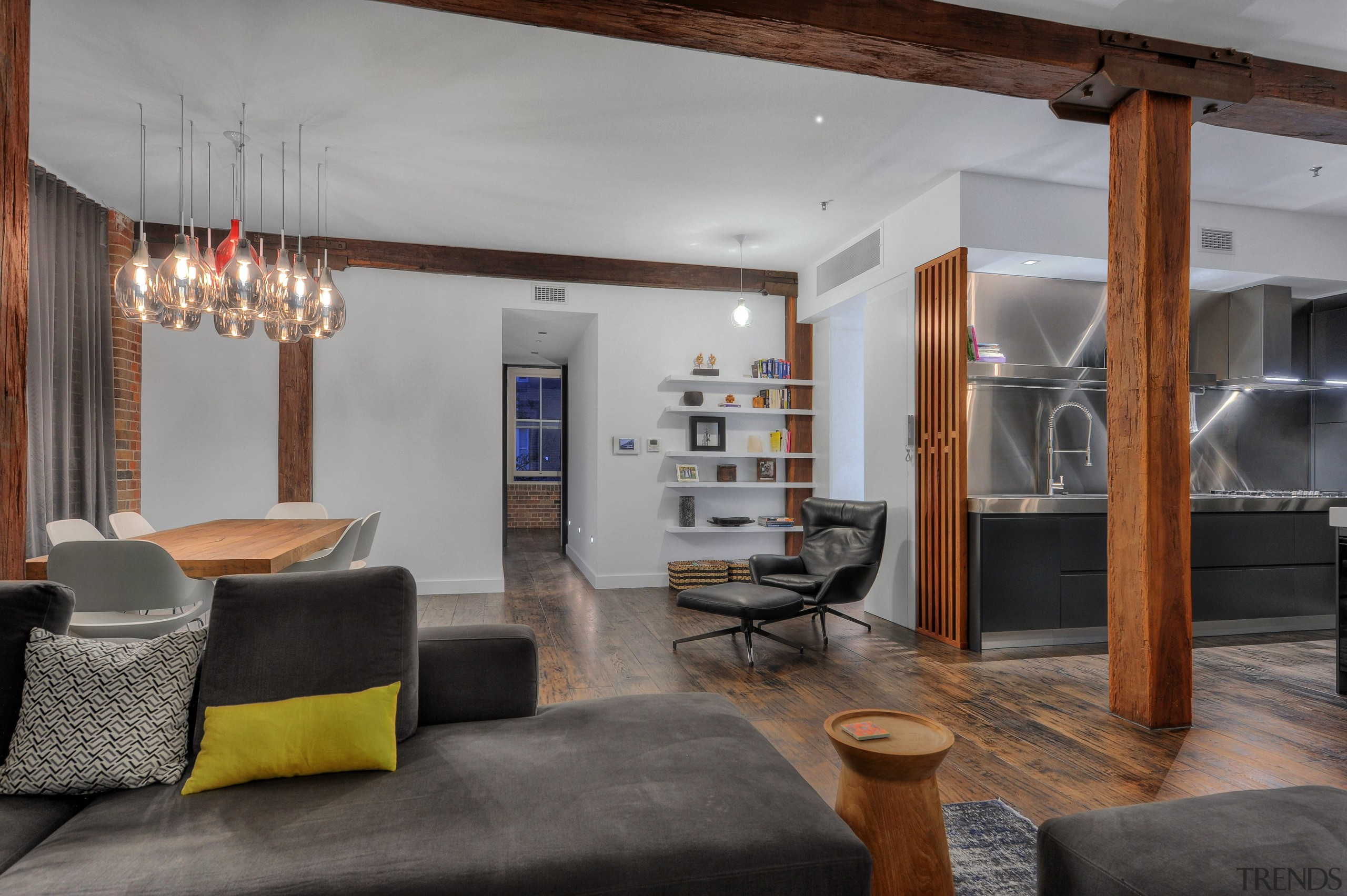 This corridor in a renovated loft-style apartment is interior design, living room, loft, gray