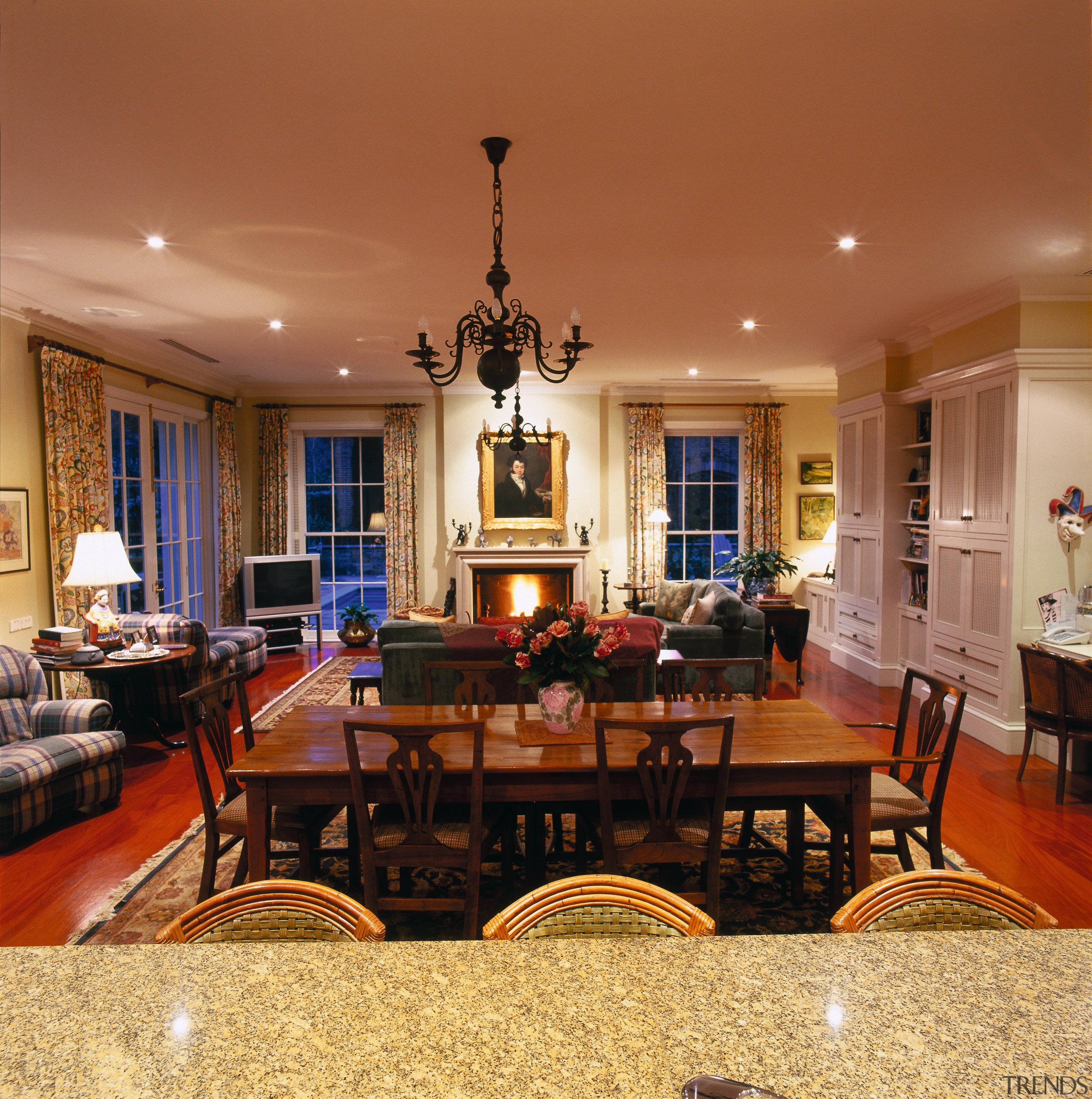 View of the dining &amp; living area - ceiling, dining room, estate, flooring, home, interior design, lighting, living room, real estate, room, table, brown, orange