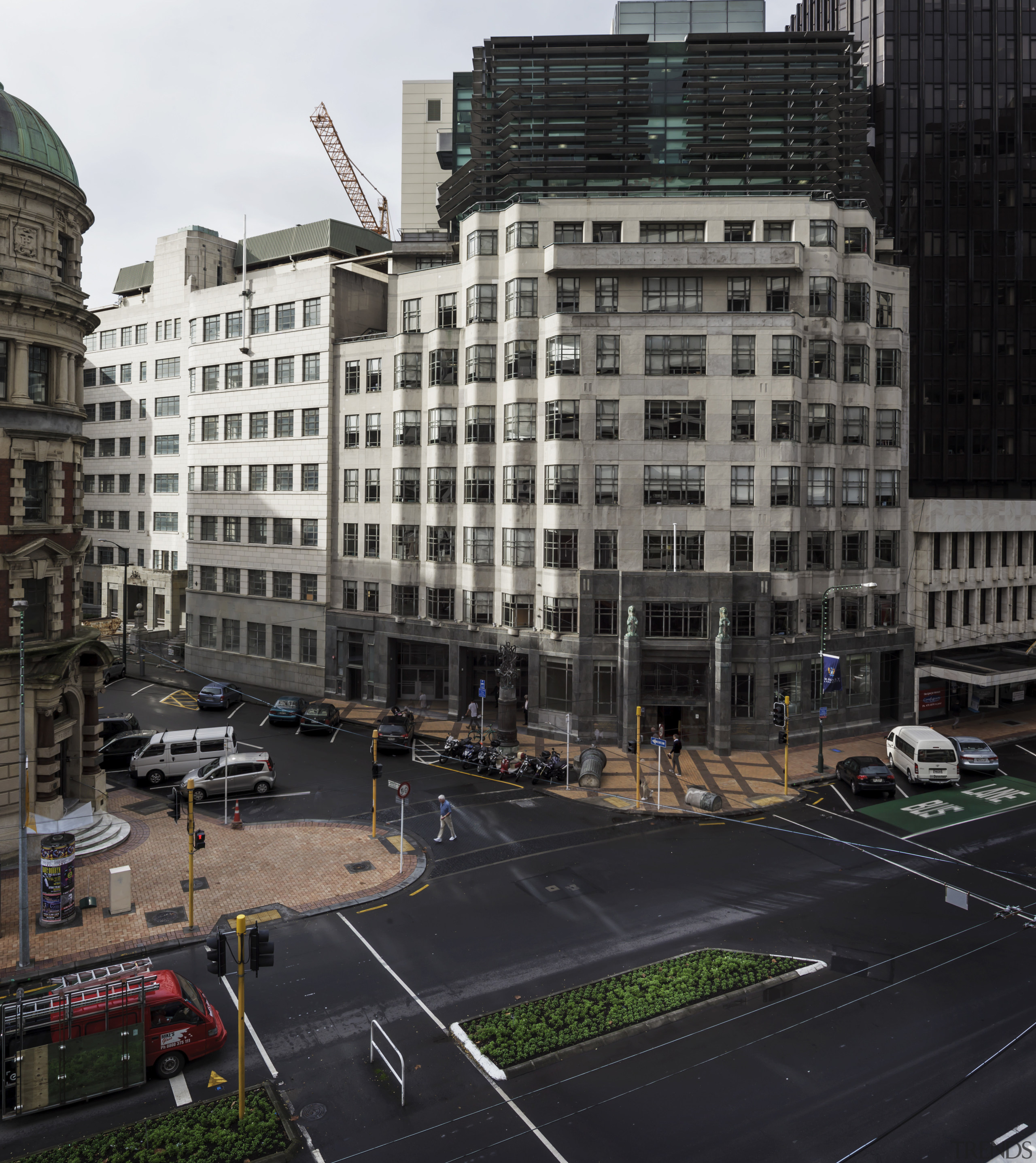 Wellingtons heritage-rated Te Puni Kokiri House has a apartment, architecture, building, car, city, cityscape, condominium, daytime, downtown, facade, house, infrastructure, metropolis, metropolitan area, mixed use, neighbourhood, residential area, road, sky, skyscraper, street, suburb, tower block, town, urban area, window, black