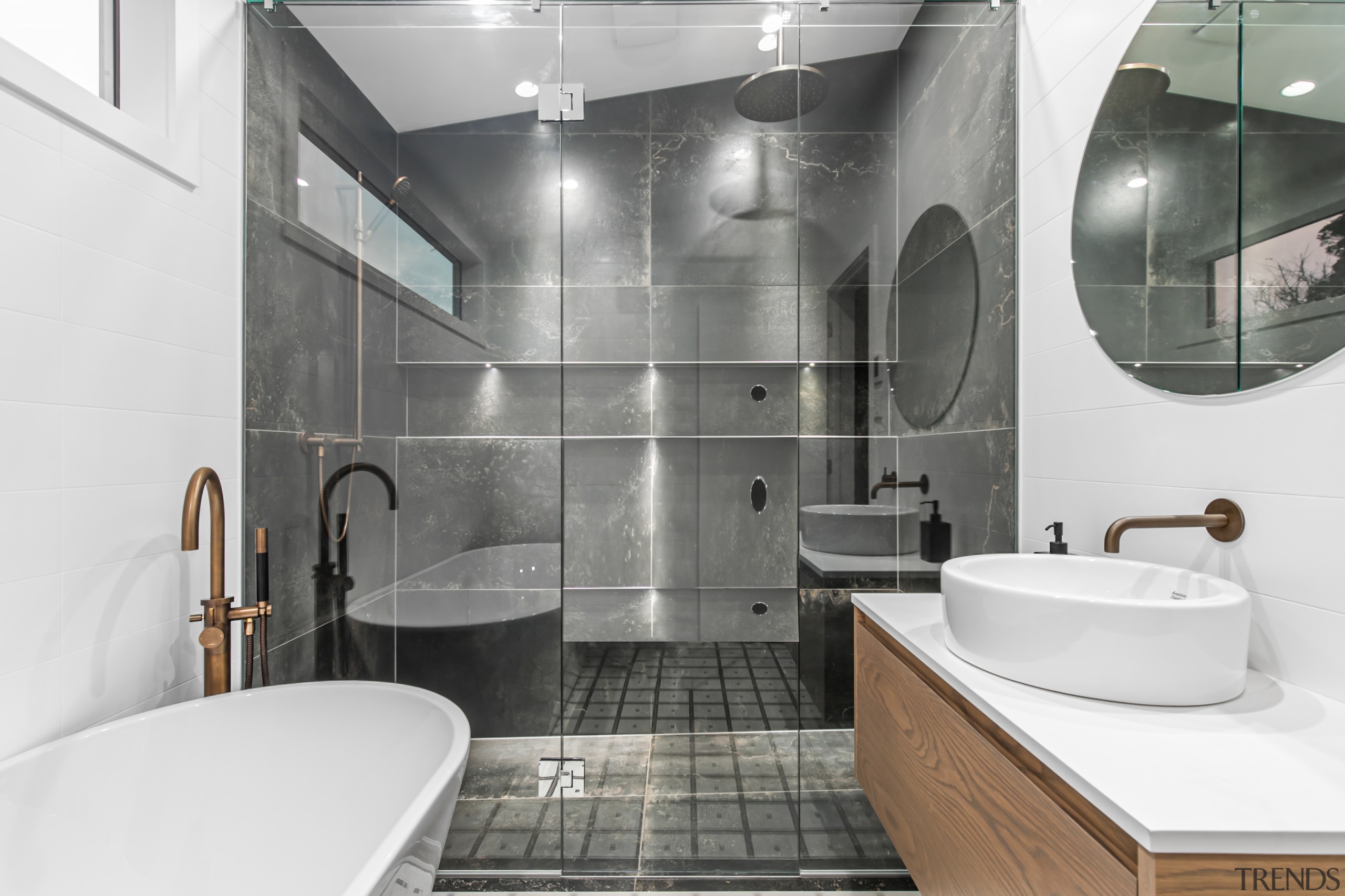 The shower stall reflections adds to the room's 