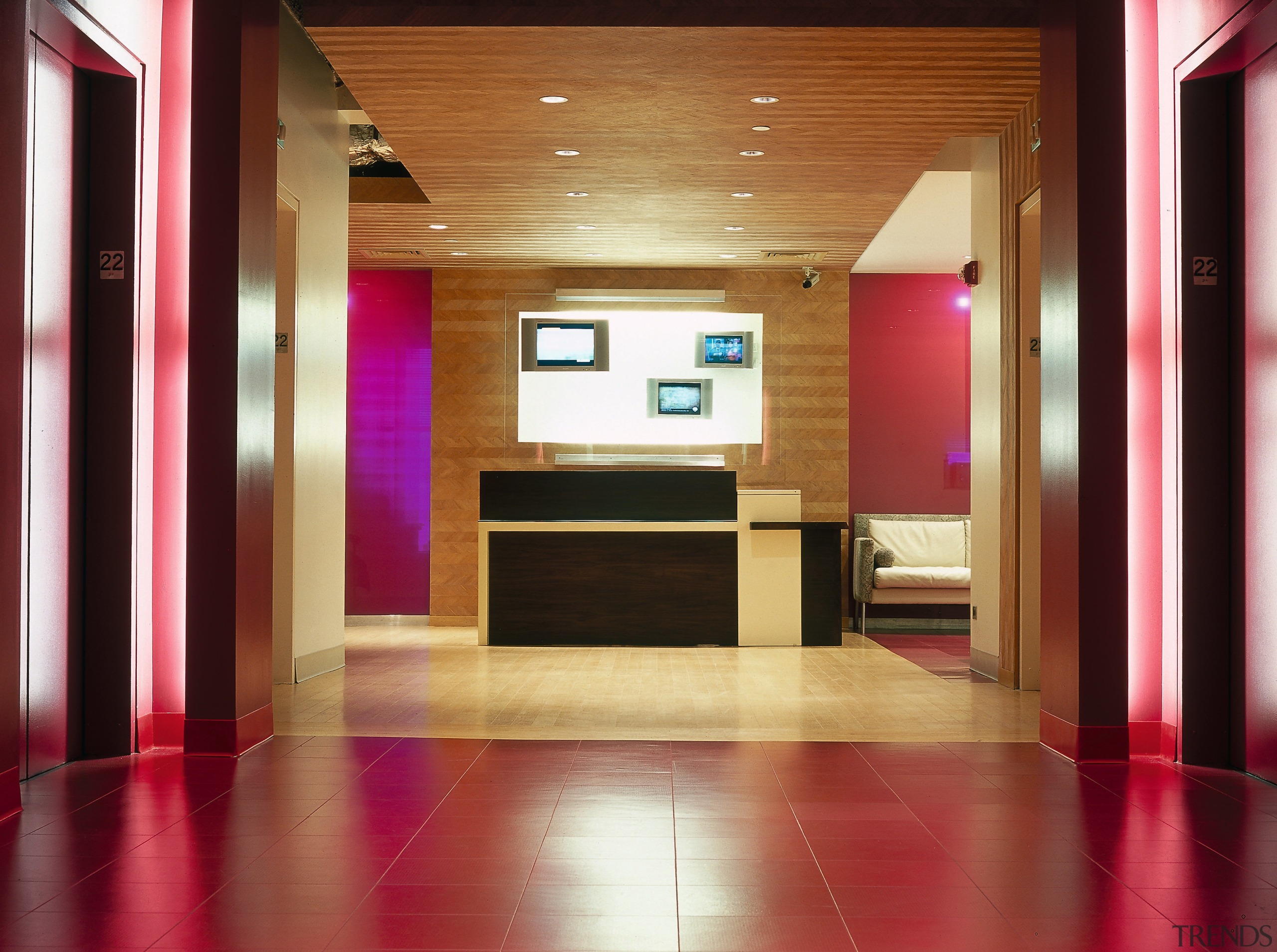 A view of the reception area, tiled floor, architecture, ceiling, floor, flooring, hall, hardwood, interior design, lobby, real estate, red