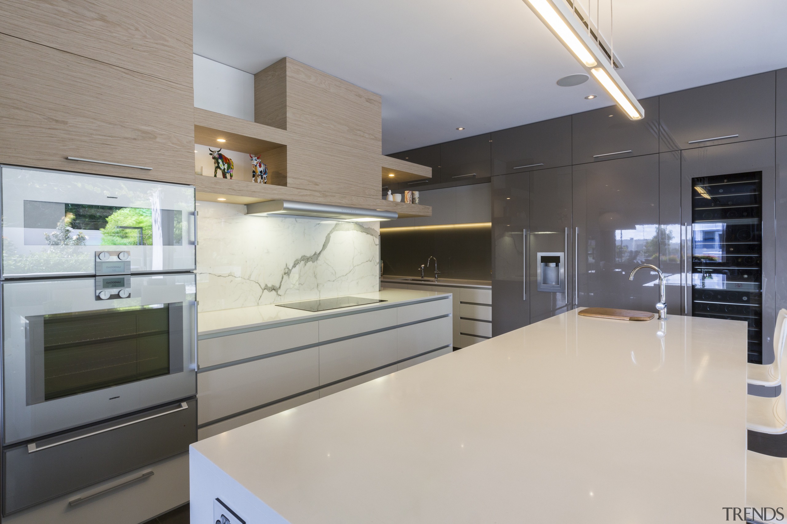 Recessed cabinet handles create a clean, minimalist look countertop, interior design, kitchen, real estate, gray