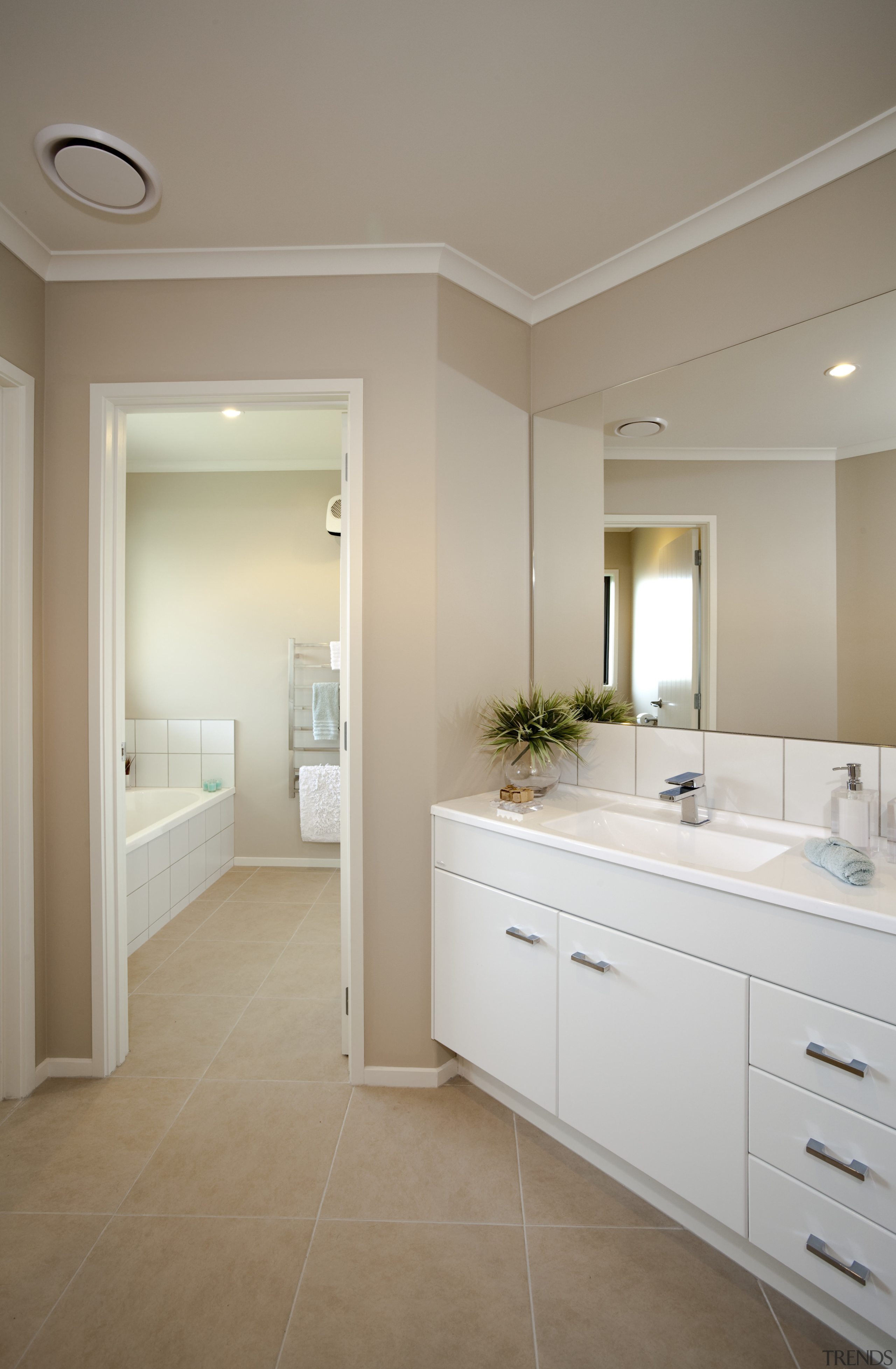 View of Platinum Homes show home with solid bathroom, ceiling, floor, flooring, home, interior design, real estate, room, sink, tile, wood flooring, gray