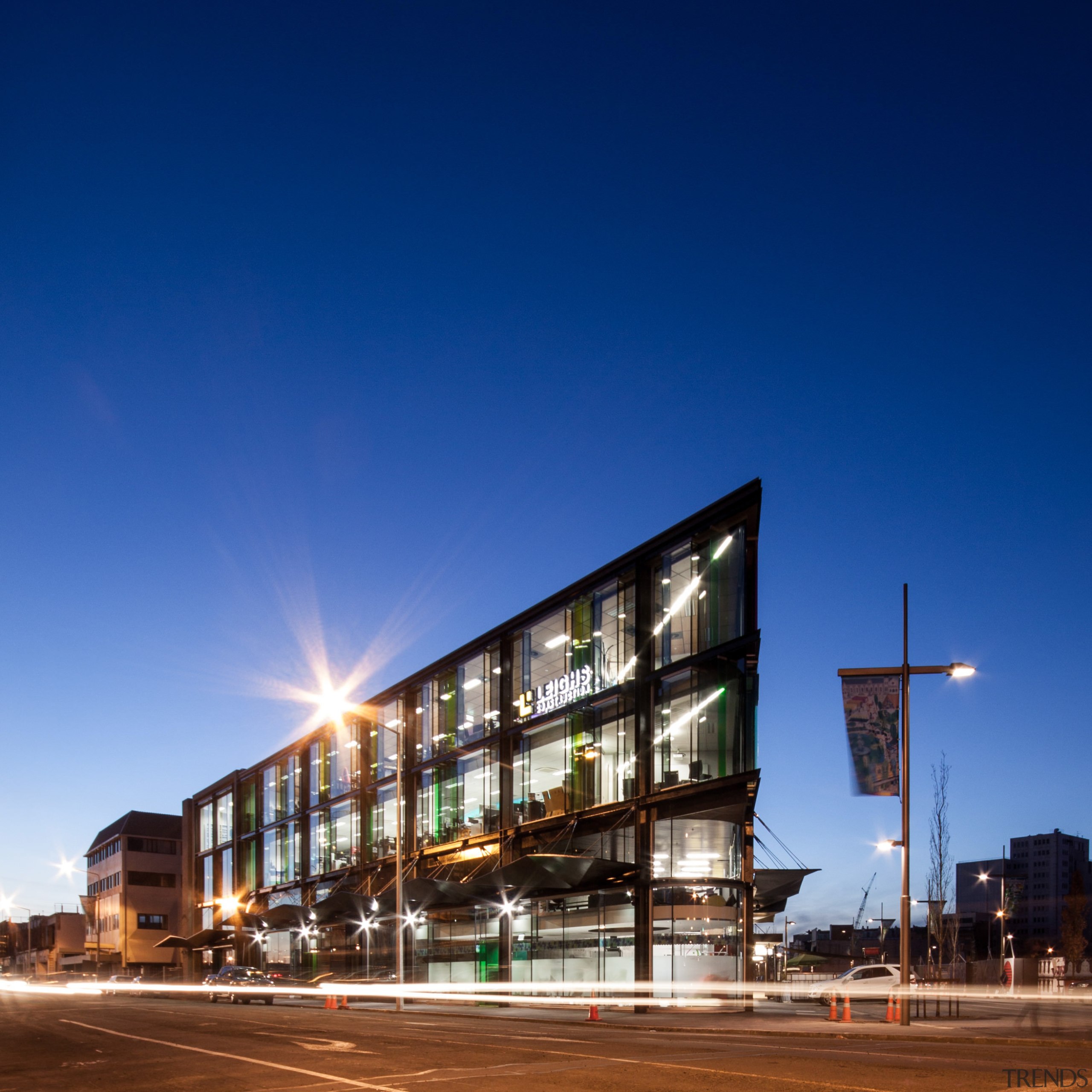 Stranges building EXteriorAbove:Standing proud alongside the heritage Bonnington architecture, building, commercial building, condominium, corporate headquarters, facade, headquarters, house, metropolis, metropolitan area, mixed use, night, real estate, residential area, sky, blue