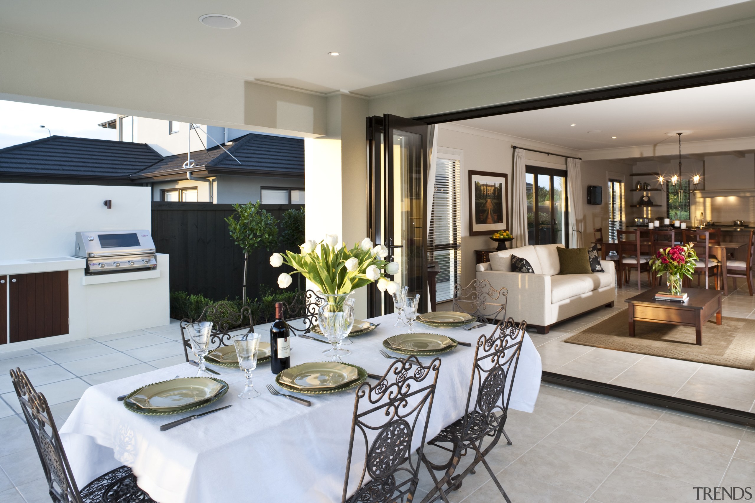 View of the covered patio area which features dining room, interior design, living room, real estate, gray