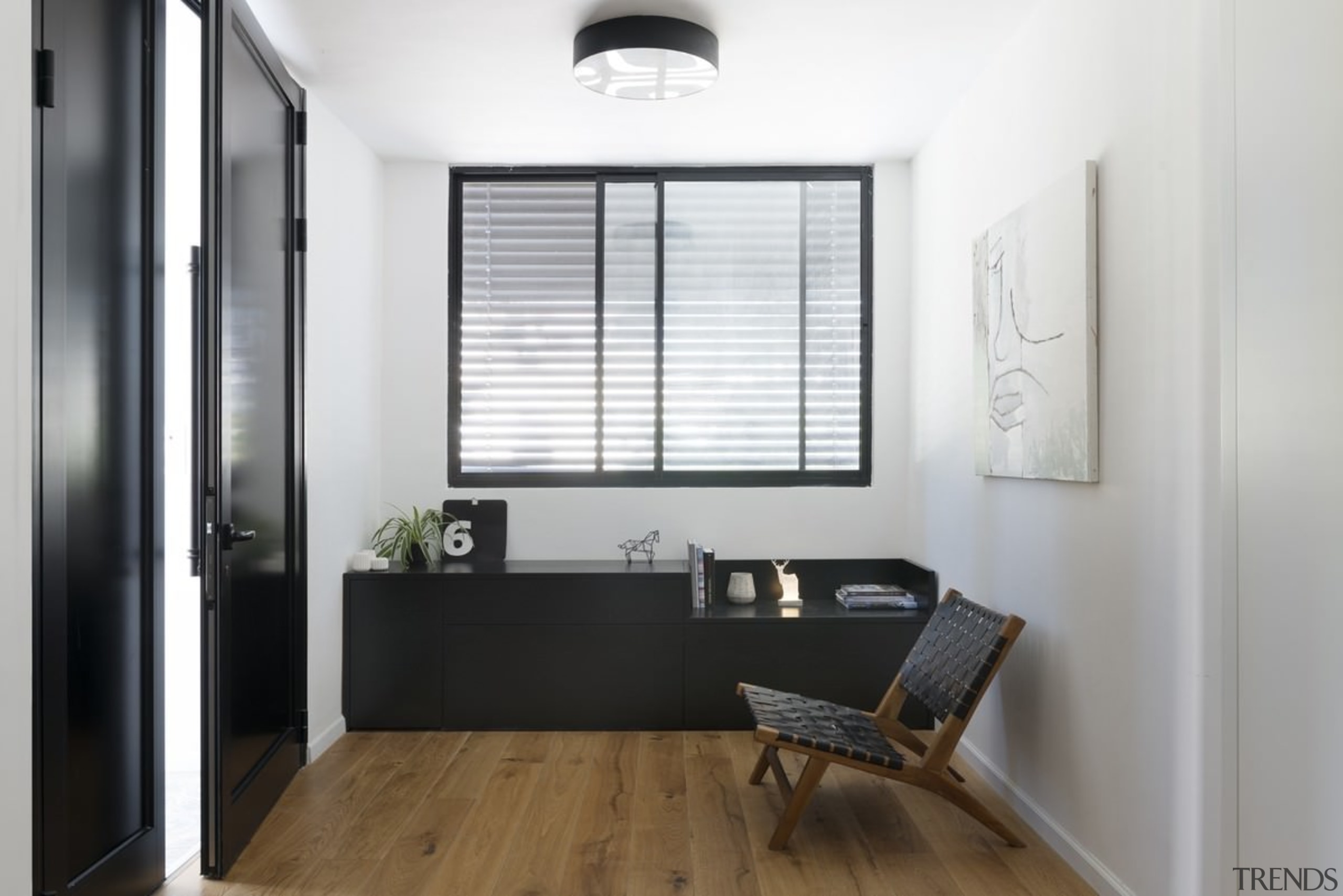 This small space features black elements, in contrast floor, interior design, real estate, window, white