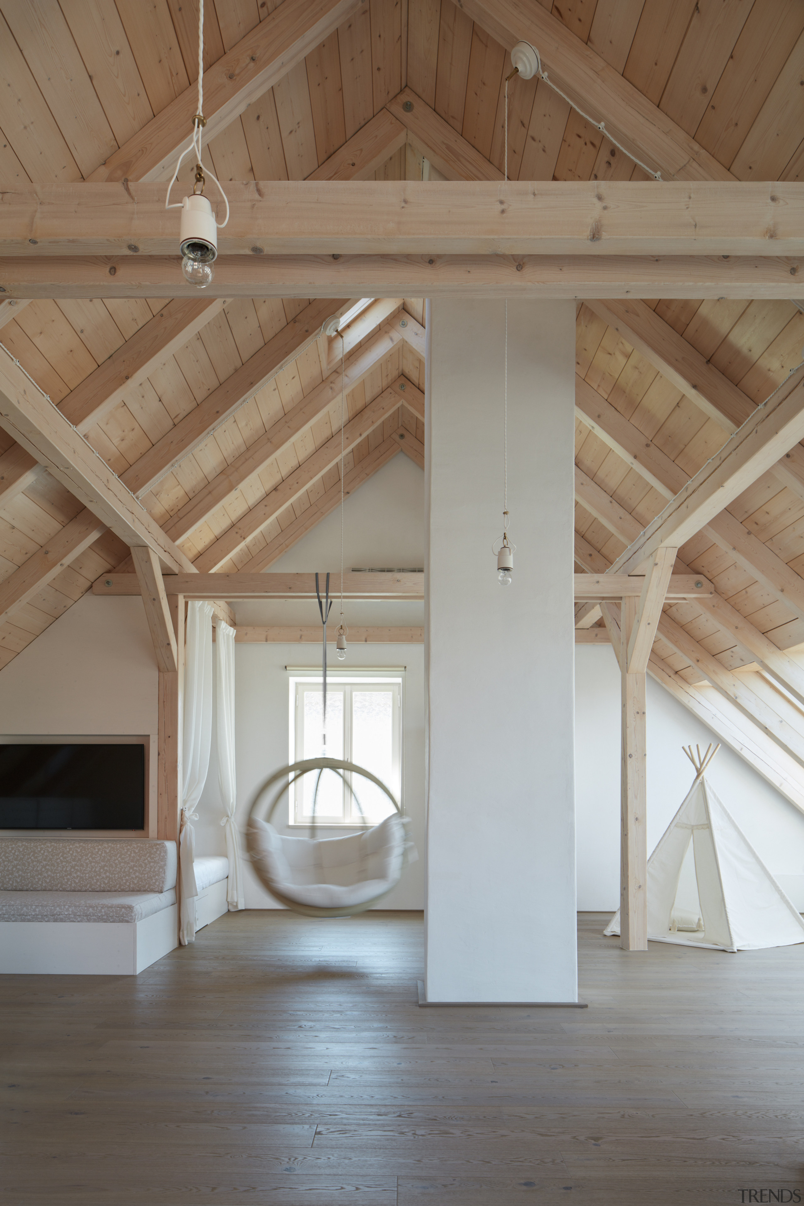The gabled roof form translated into soaring ceilings 