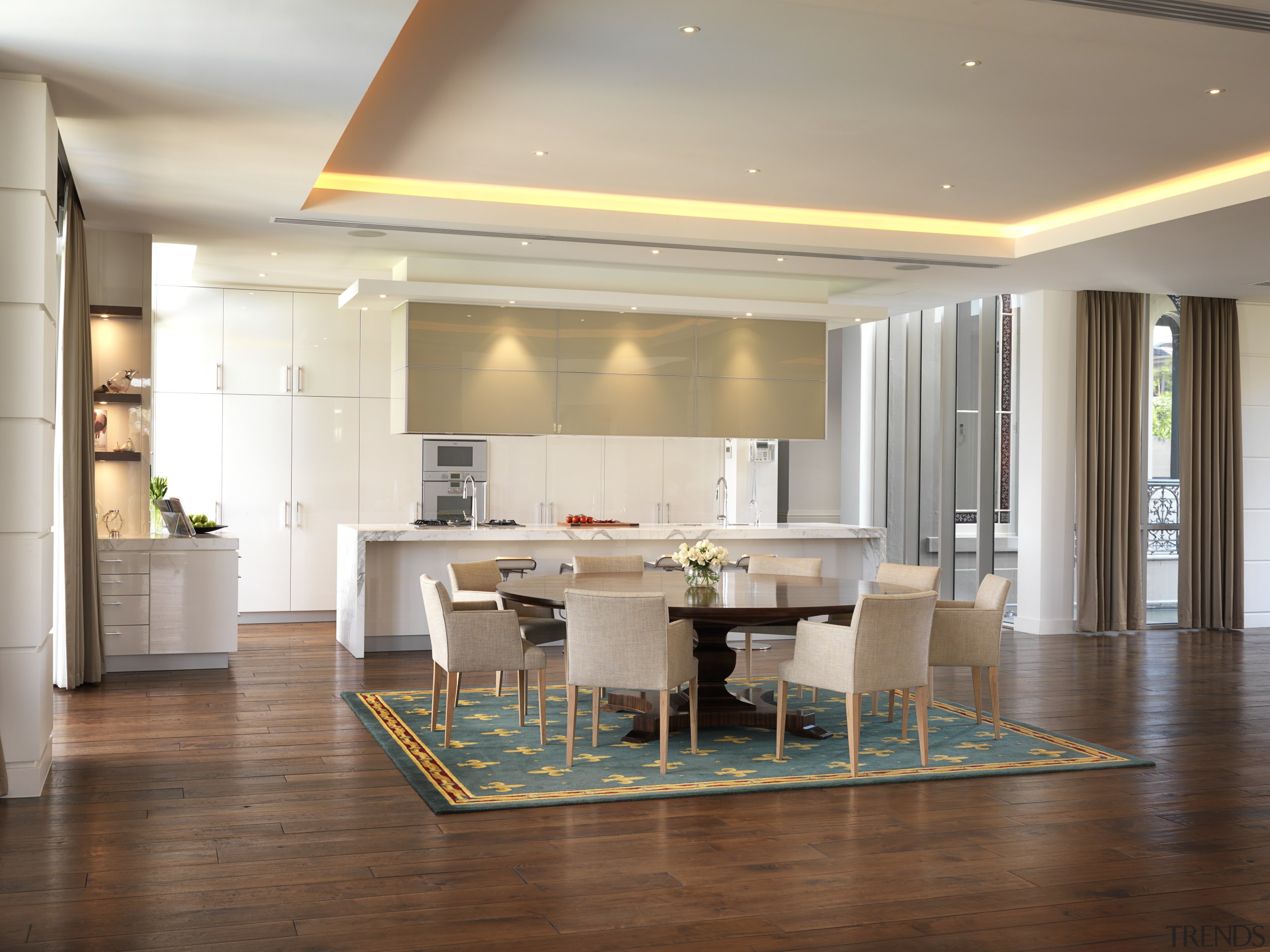 View of the open-plan kitchen and dining area ceiling, dining room, floor, flooring, hardwood, interior design, laminate flooring, living room, real estate, room, table, wood flooring, gray, brown