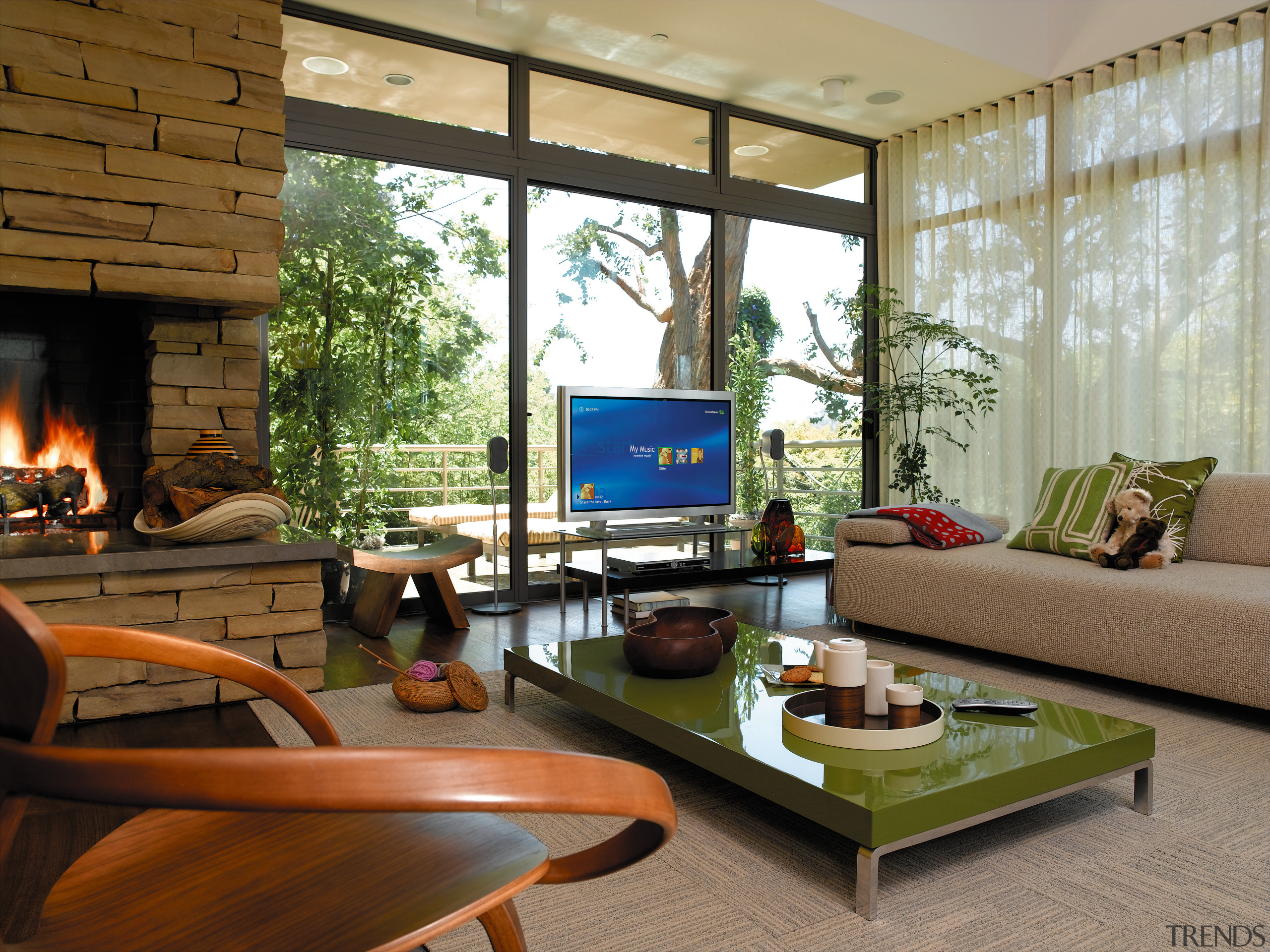 view of this living area featuring green coffee home, house, interior design, living room, real estate, window, brown
