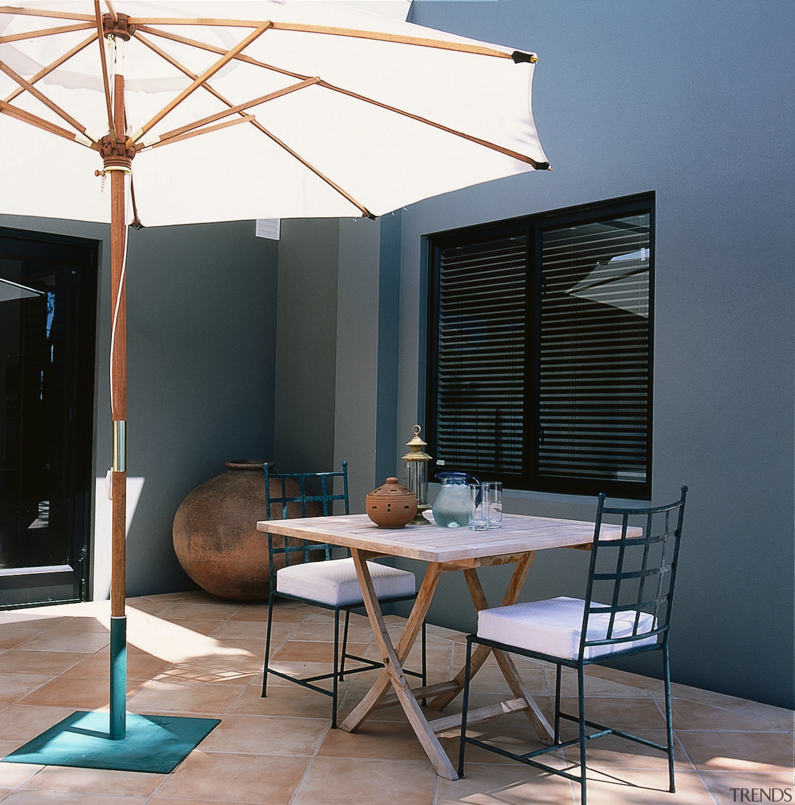 view of outdoor entertainment area with vinetian blinds chair, furniture, interior design, shade, table, black, gray