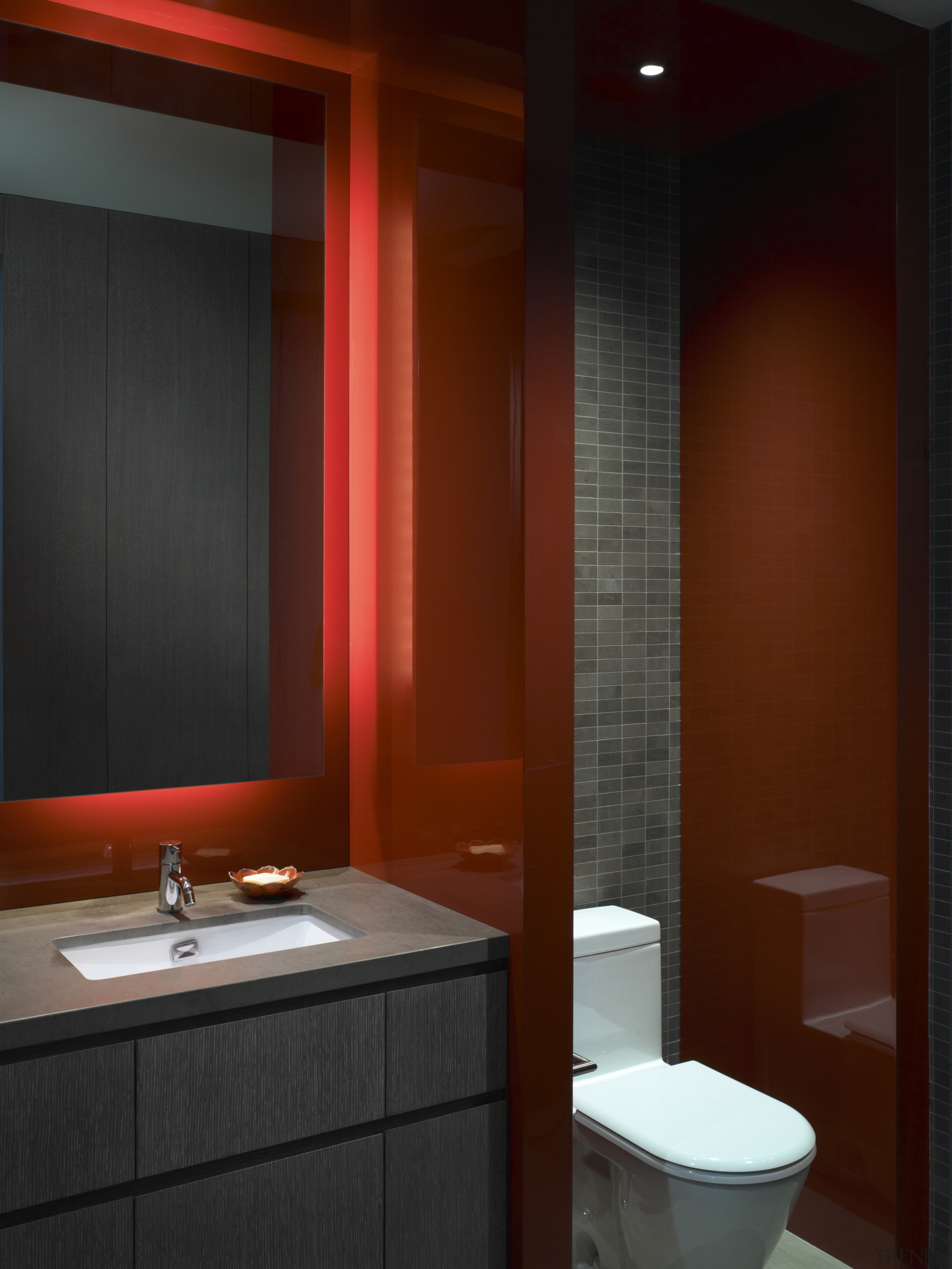 View of this contemporary apartment that has been bathroom, bathroom accessory, ceiling, interior design, lighting, room, red, black