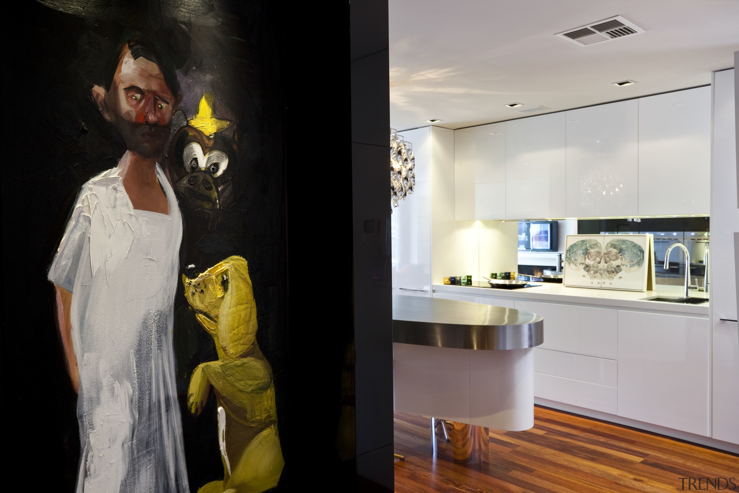 View of kitchen with wooden flooring and painting. art exhibition, boutique, exhibition, interior design, room, gray, black