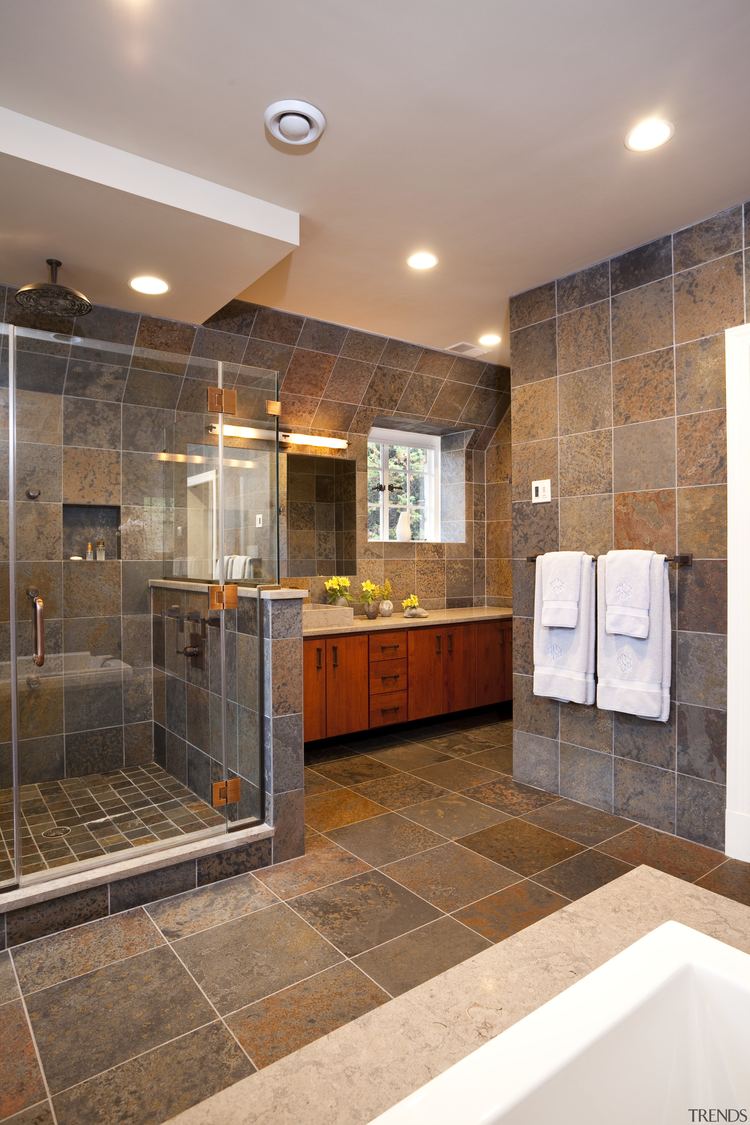 View of bathroom with grey floor and wall bathroom, cabinetry, countertop, floor, flooring, home, interior design, real estate, room, tile, brown, gray