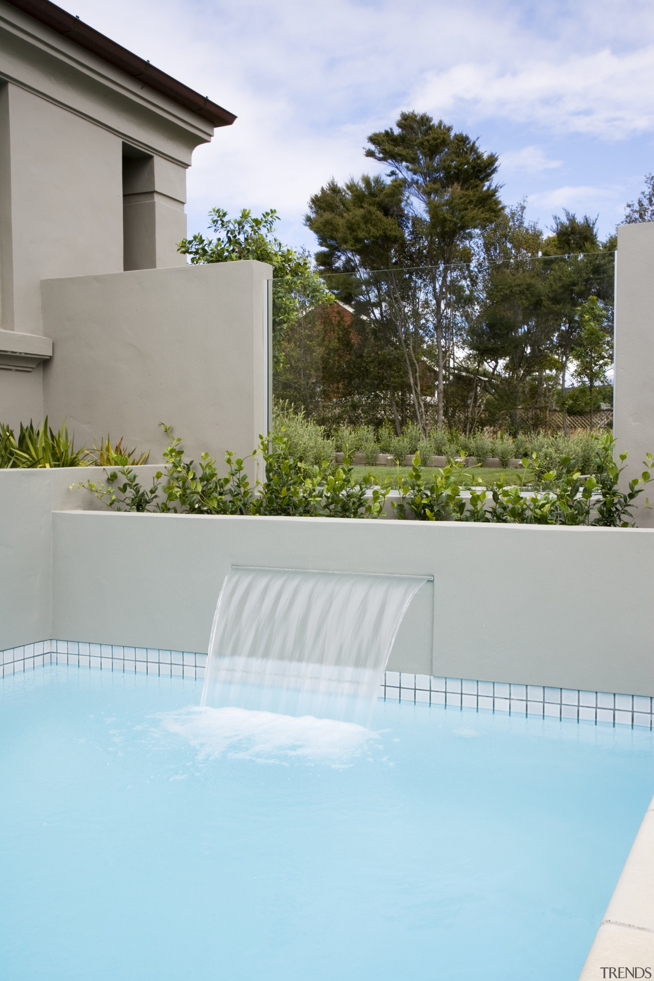 A close up view of a swimming pool architecture, backyard, estate, fence, home, house, leisure, property, real estate, residential area, swimming pool, water, water feature, gray, teal