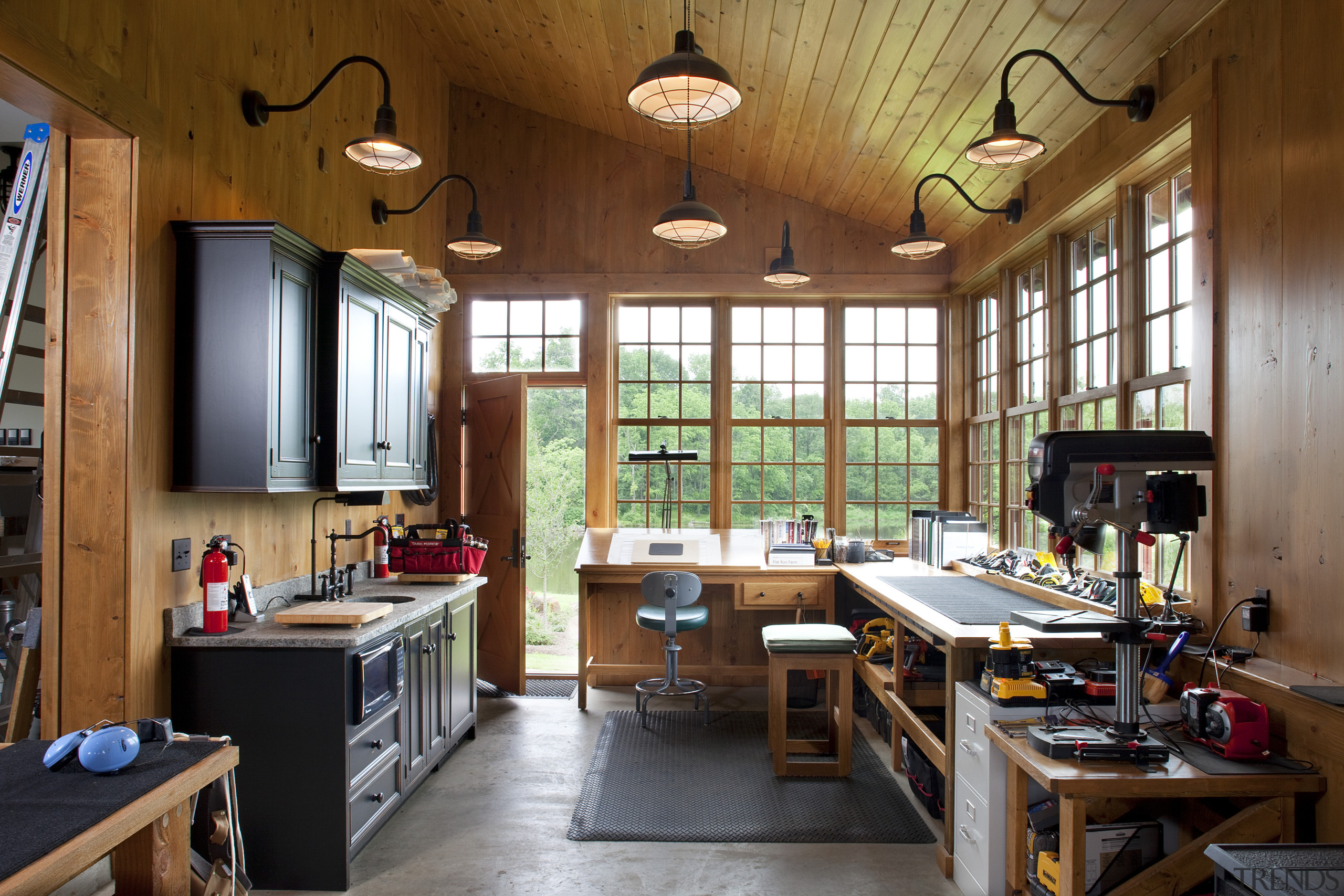 View of workshop with wooden walls and ceiling. countertop, interior design, kitchen, real estate, room, wood, brown