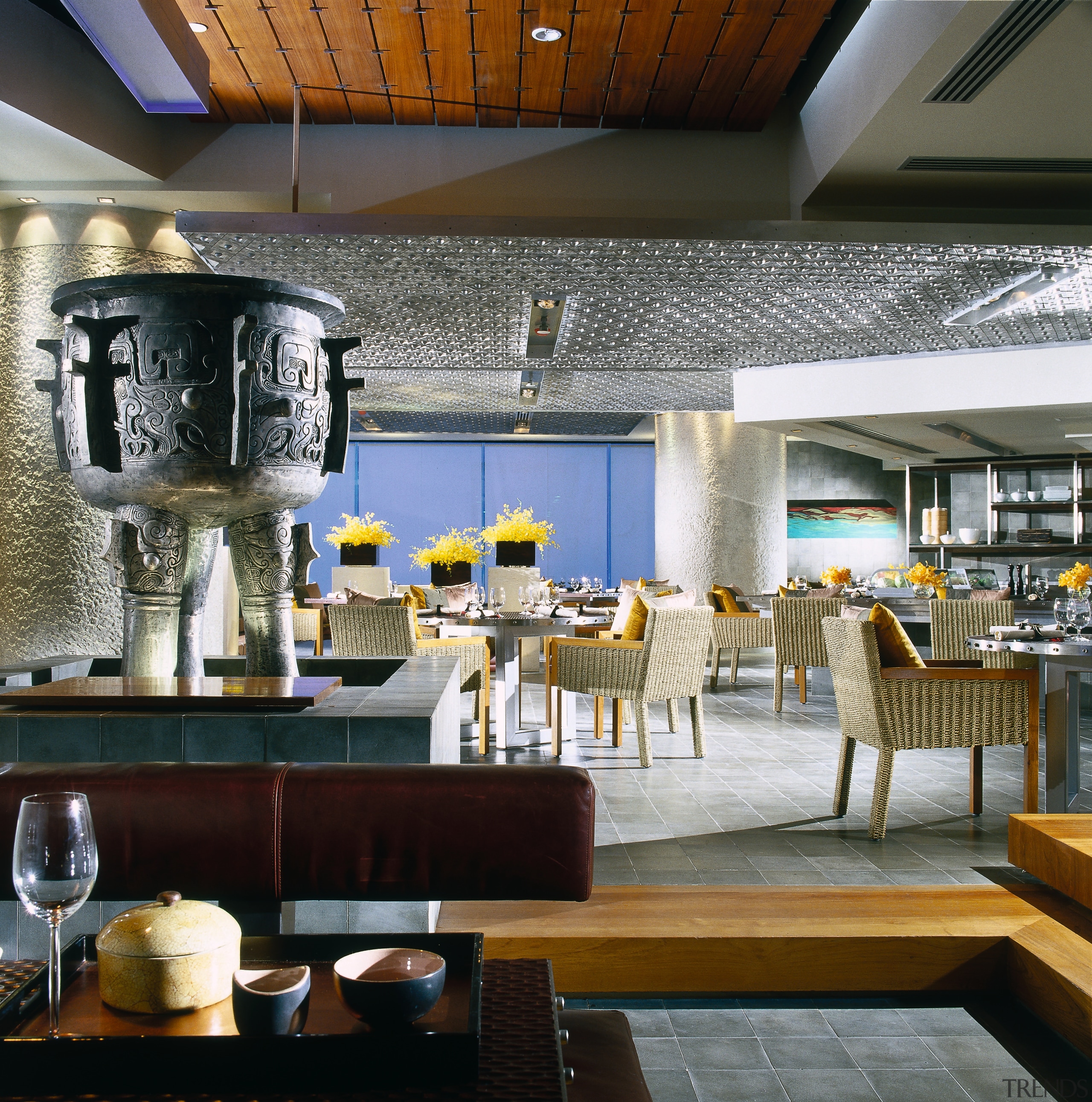 Restaurant area with patterned metal ceiling and column, interior design, restaurant, black