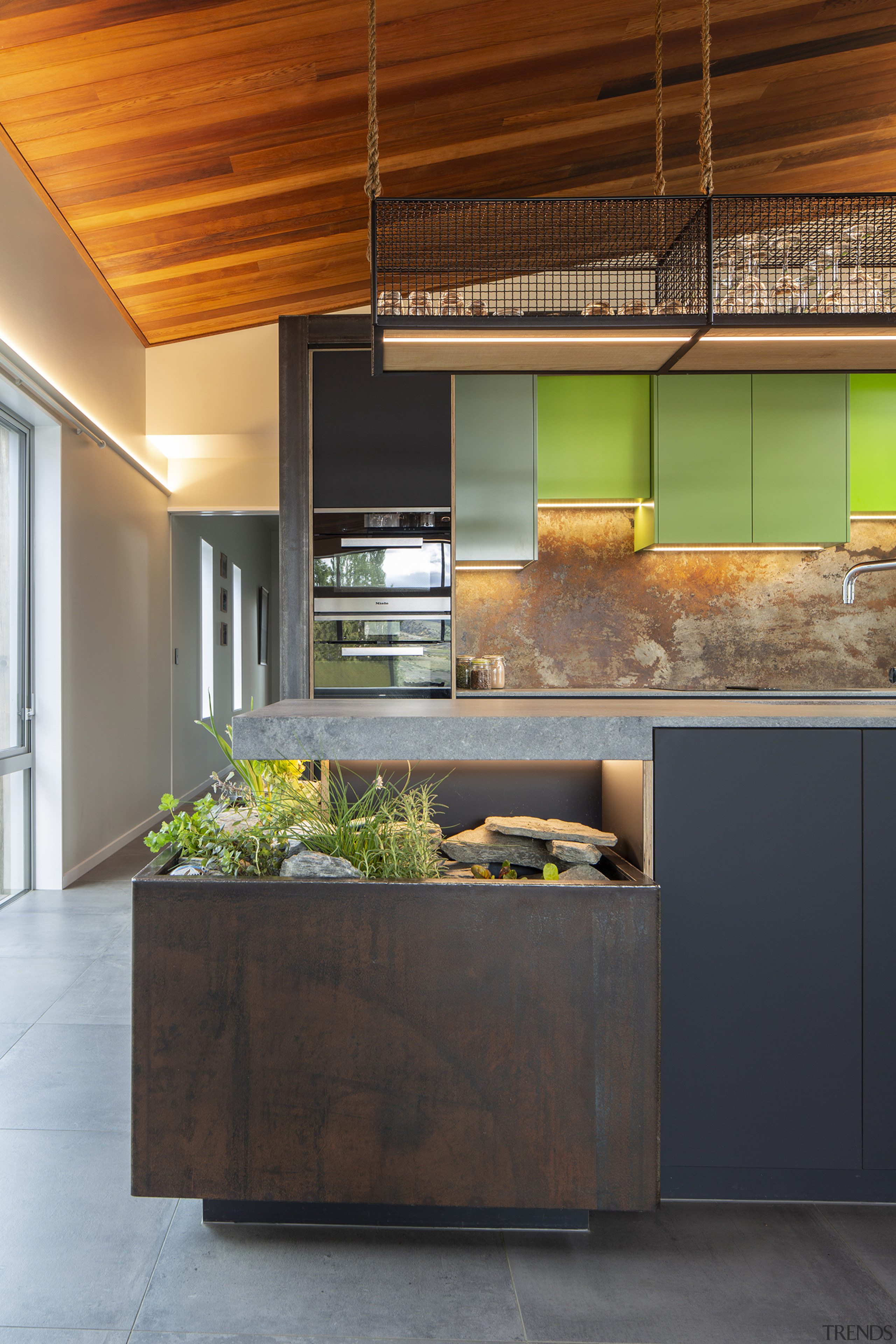 The kitchen includes a corner herb garden complete 