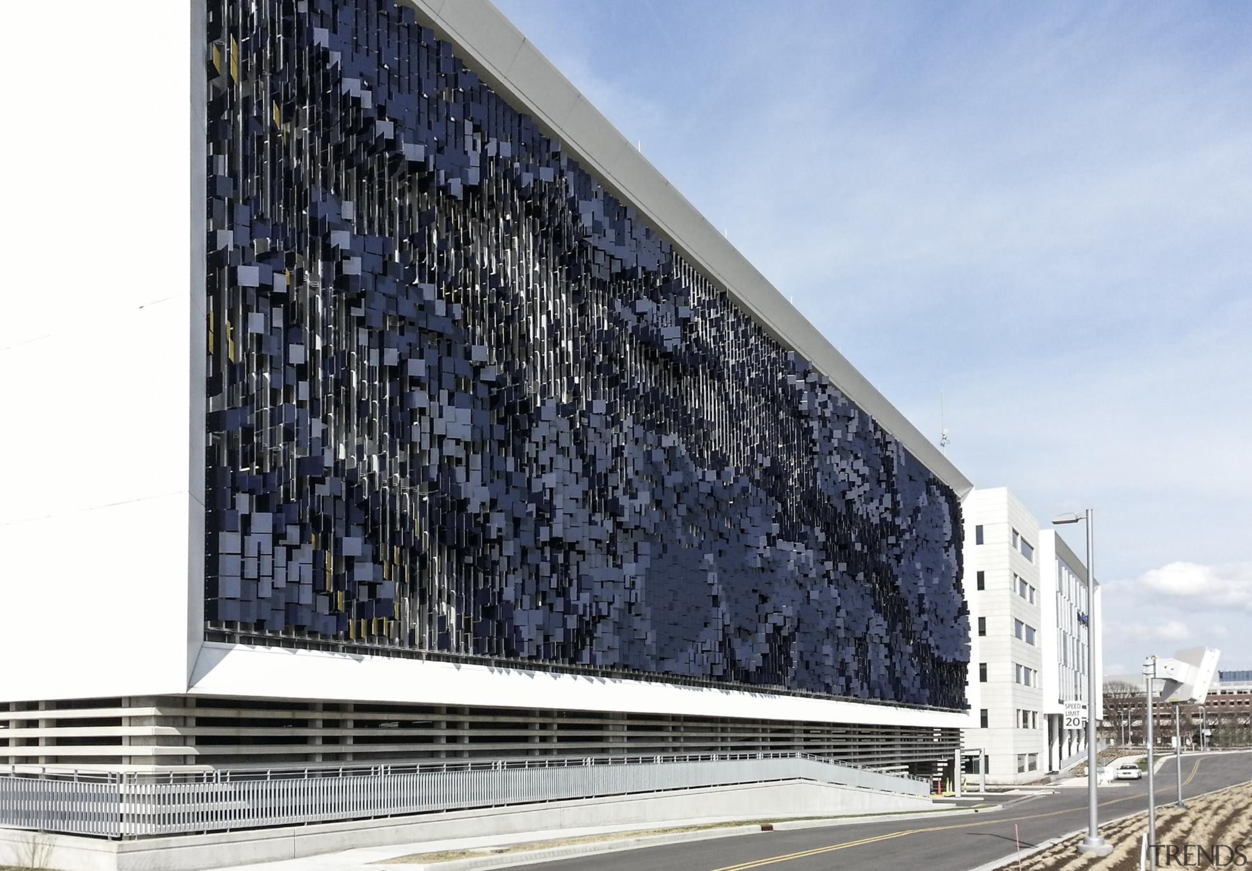 This display on the parking structure at Eskenazi architecture, building, commercial building, corporate headquarters, facade, headquarters, sky, structure, white, black