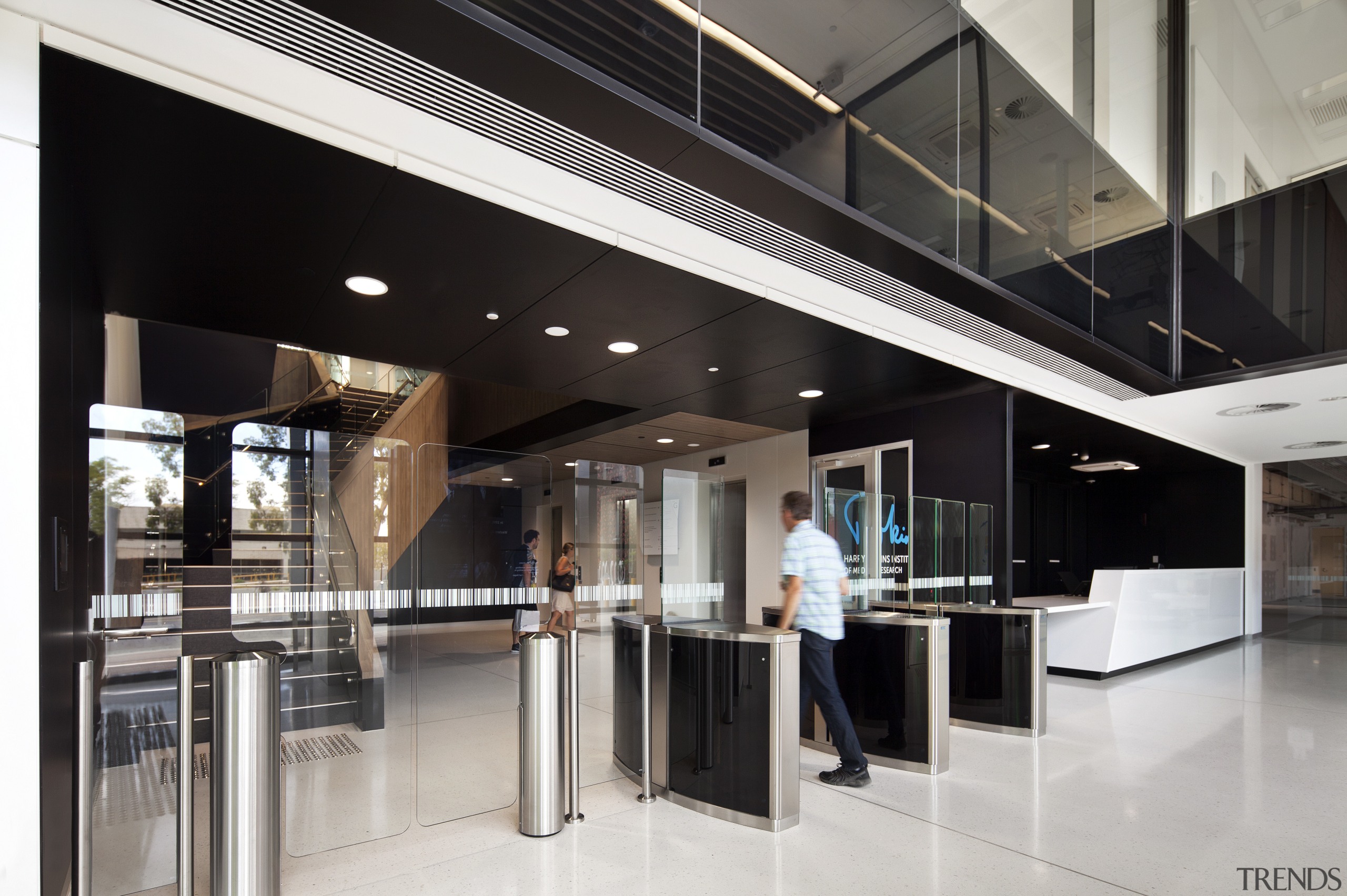 A black ceiling creates an intimate entry for glass, interior design, lobby, black, white